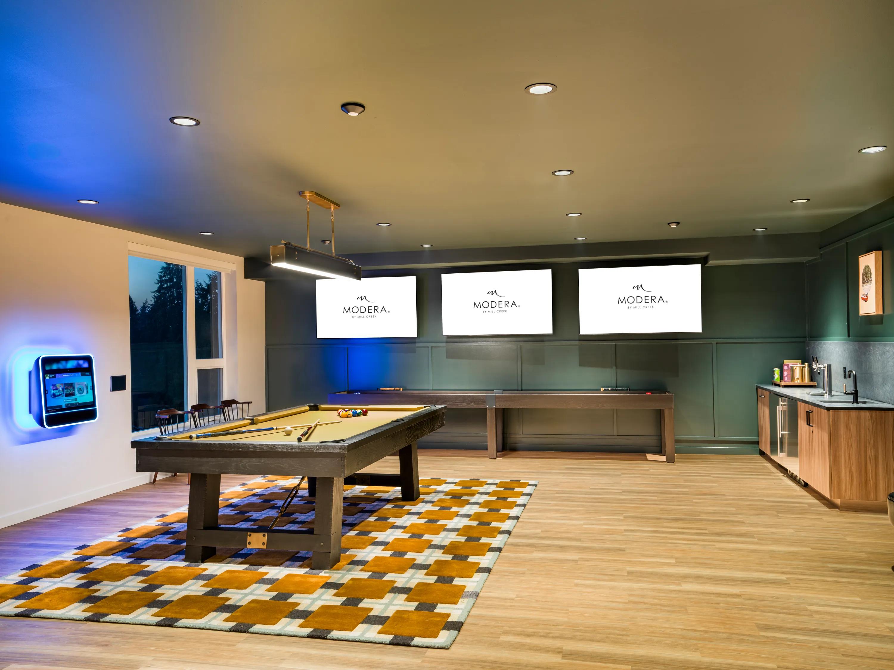 game room with billiards table and seating modera shoreline apartment homes for rent in wa