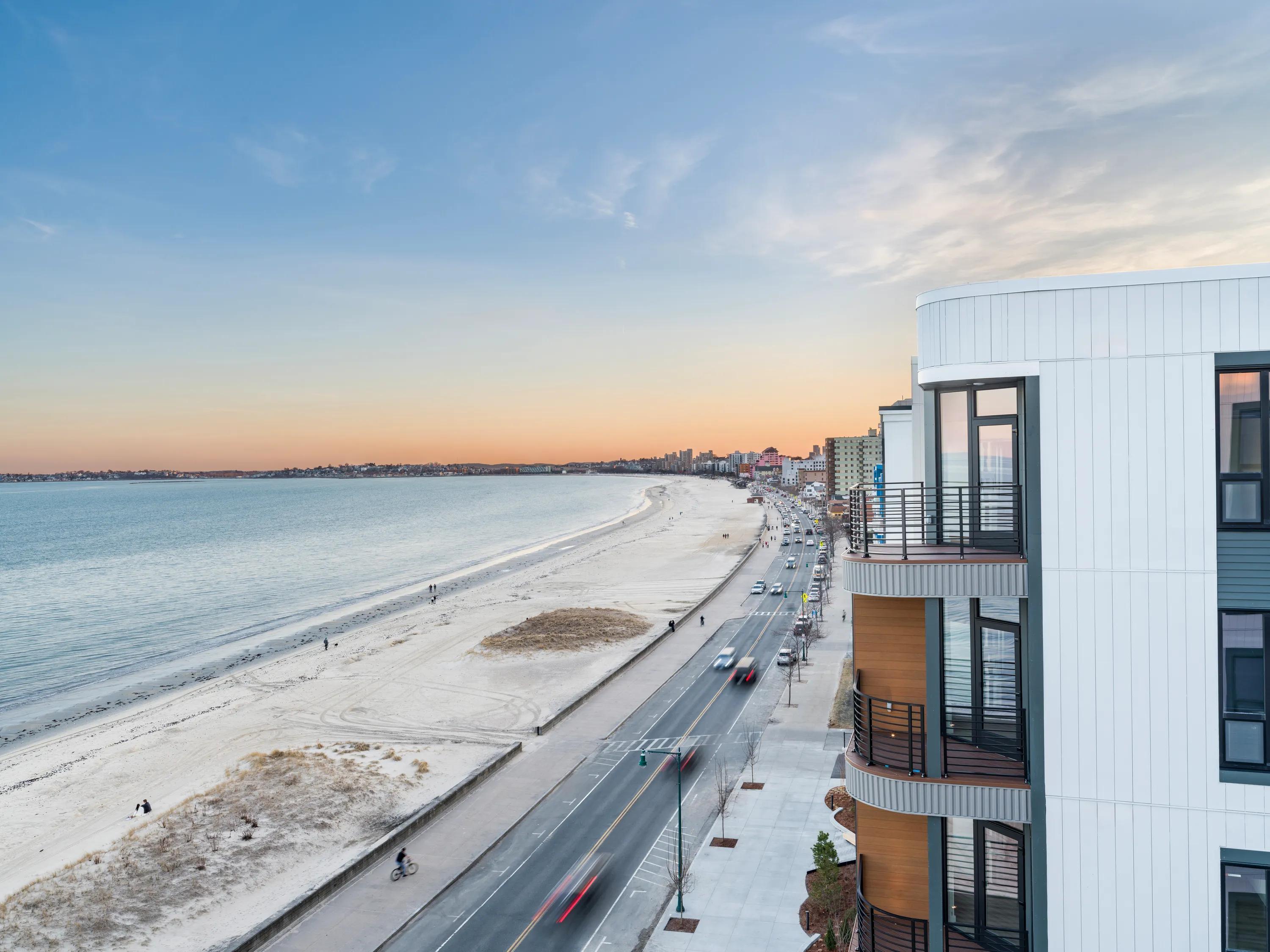 sunrise over beach in front of modera revere beach apartments for rent in revere beach ma near boston