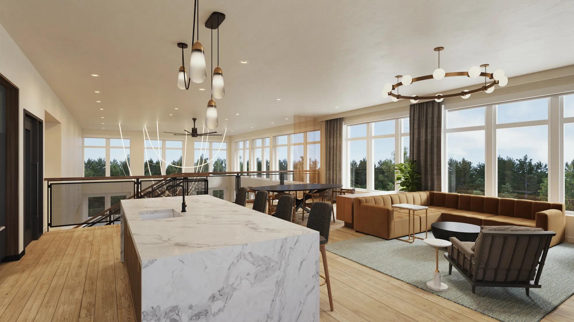 clubroom with demonstration kitchen and balcony with large windows at modera shoreline apartment homes for rent in wa
