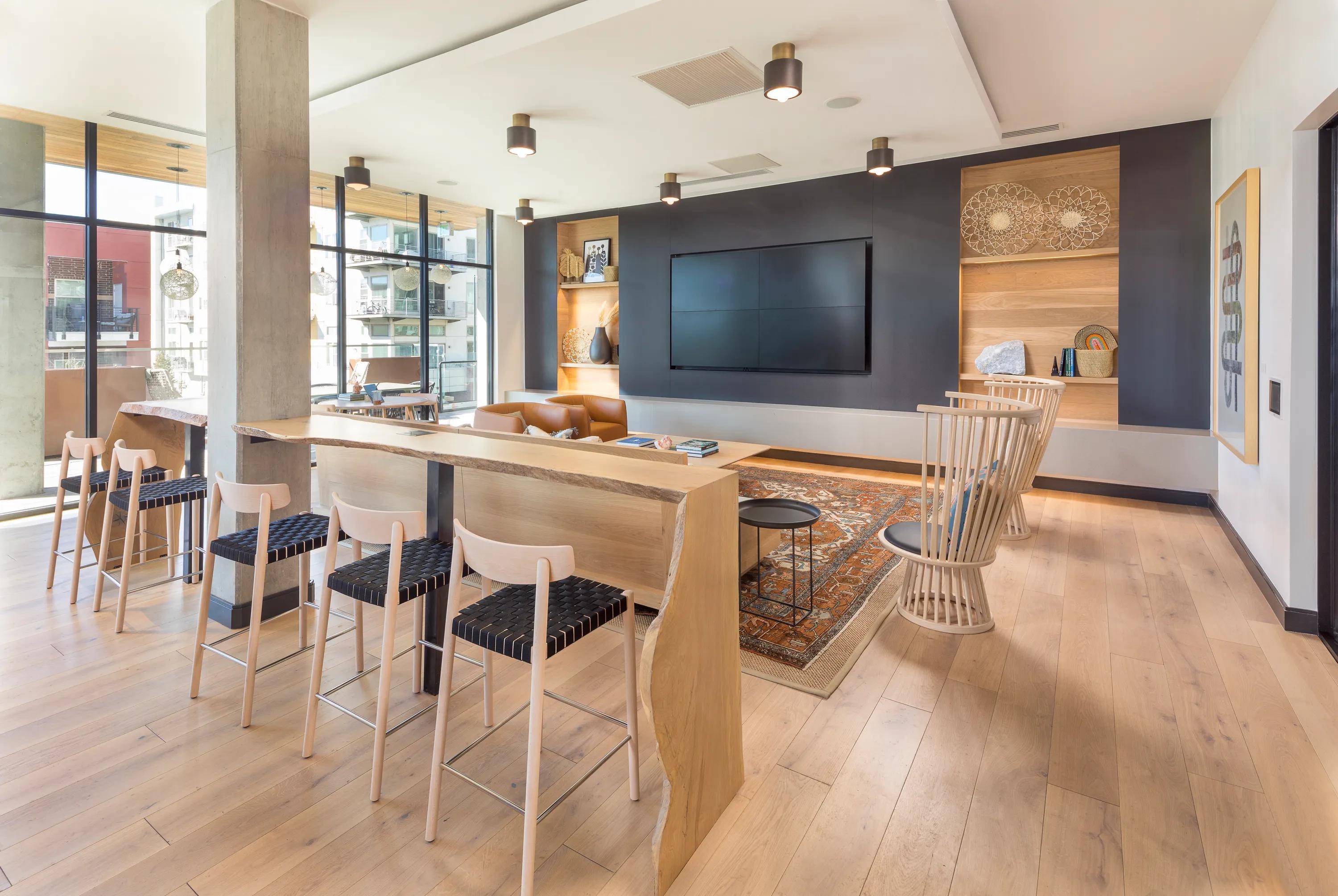 WiFi lounge with large flatscreen TV and coffee bar modera lohi apartments in denver co
