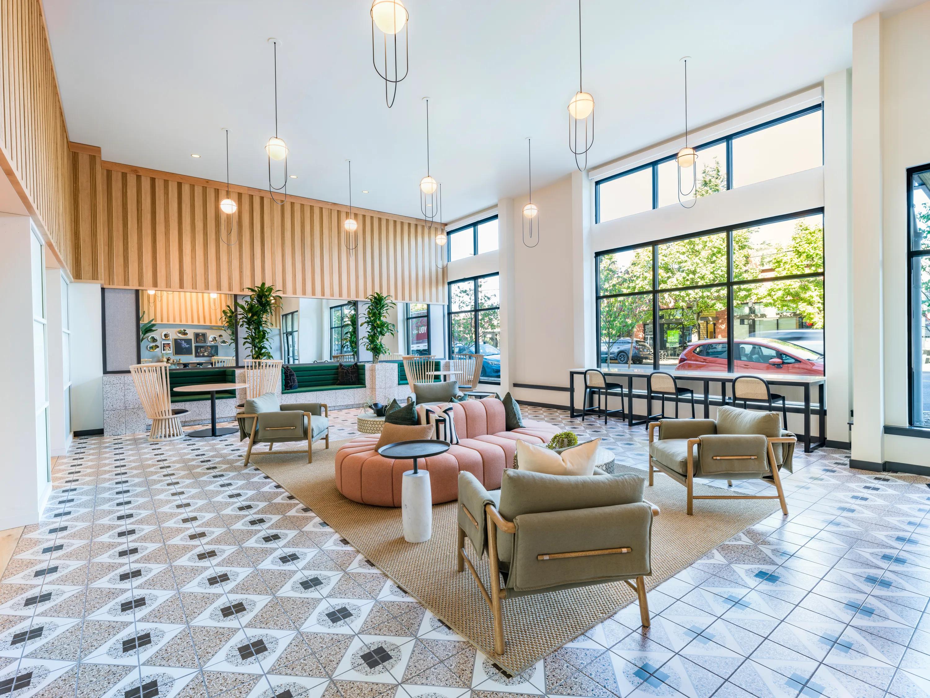 leasing office with large seating area at modera woodstock apartment homes for rent in portland or