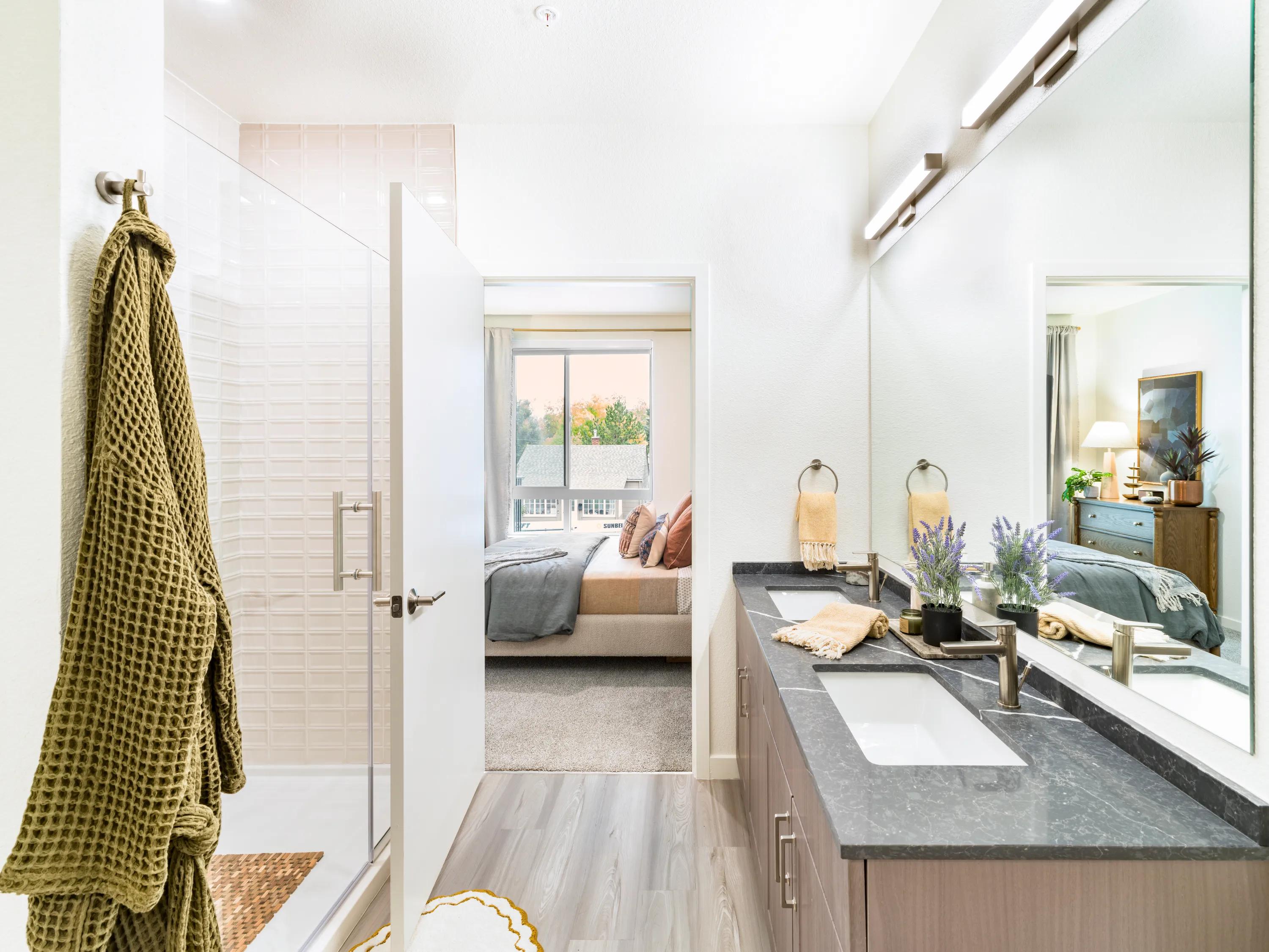 Serene bathrooms with spa-like soaking tubs modera university park denver co