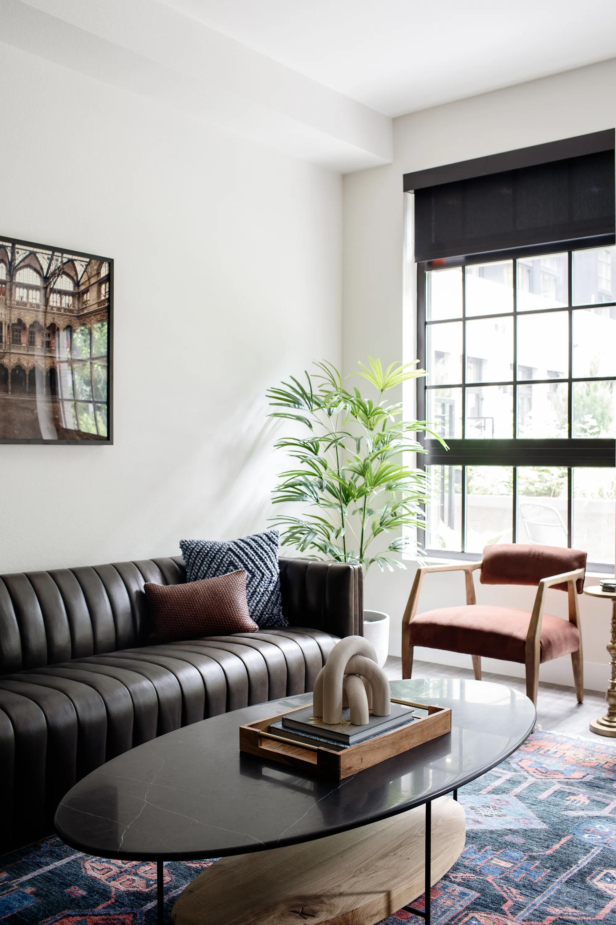 Oversized windows with motorized roller-shades modera art park denver co