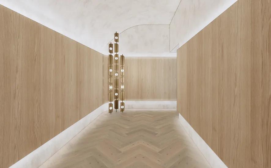 Arched passageway with oak wall paneling modera second avenue apartments in denver co