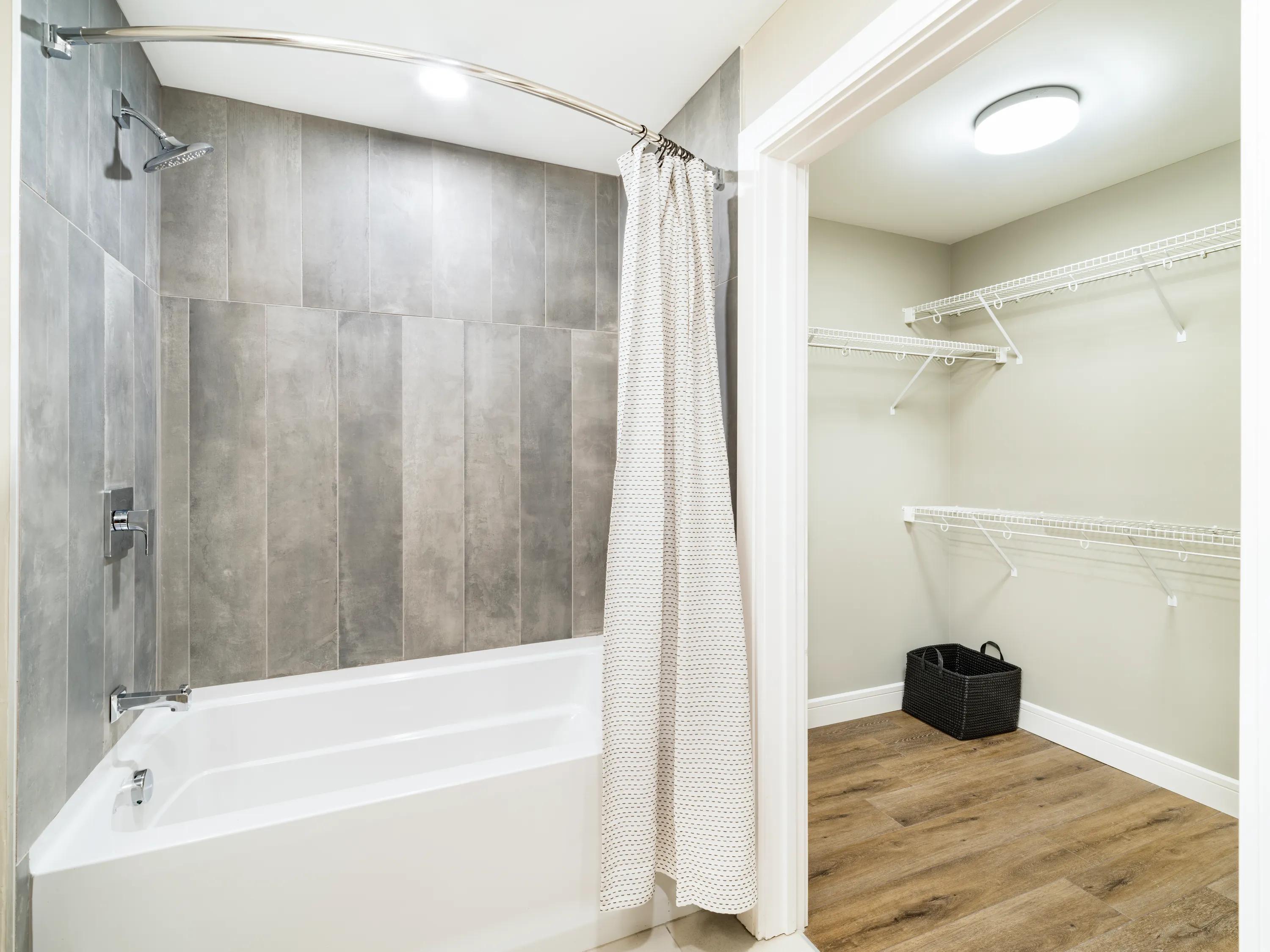 spacious bathroom with tile showers modera mcgavock apartments for rent in nashville tn