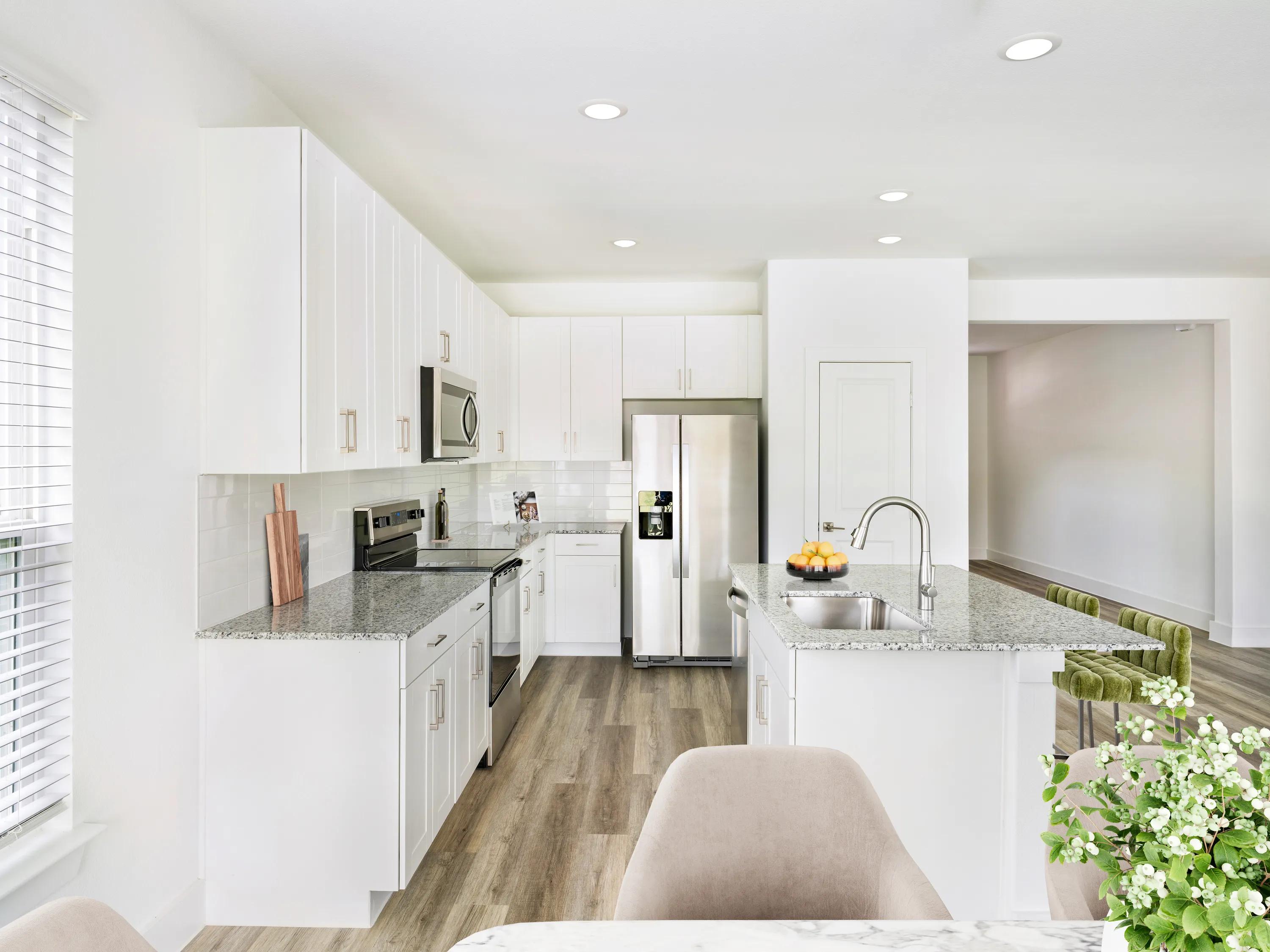 kitchen with island at amavi celina single family homes for rent in texas