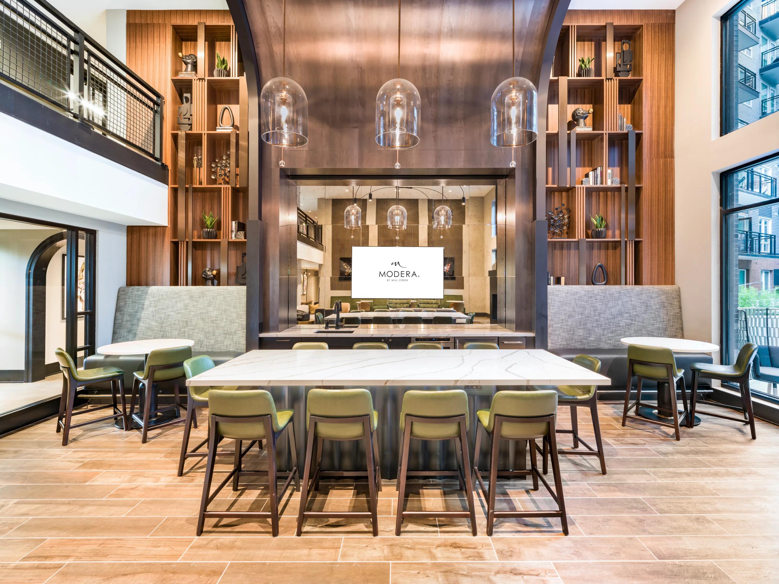 community demonstration kitchen with modern finishes modera h street apartment homes for rent in washington dc