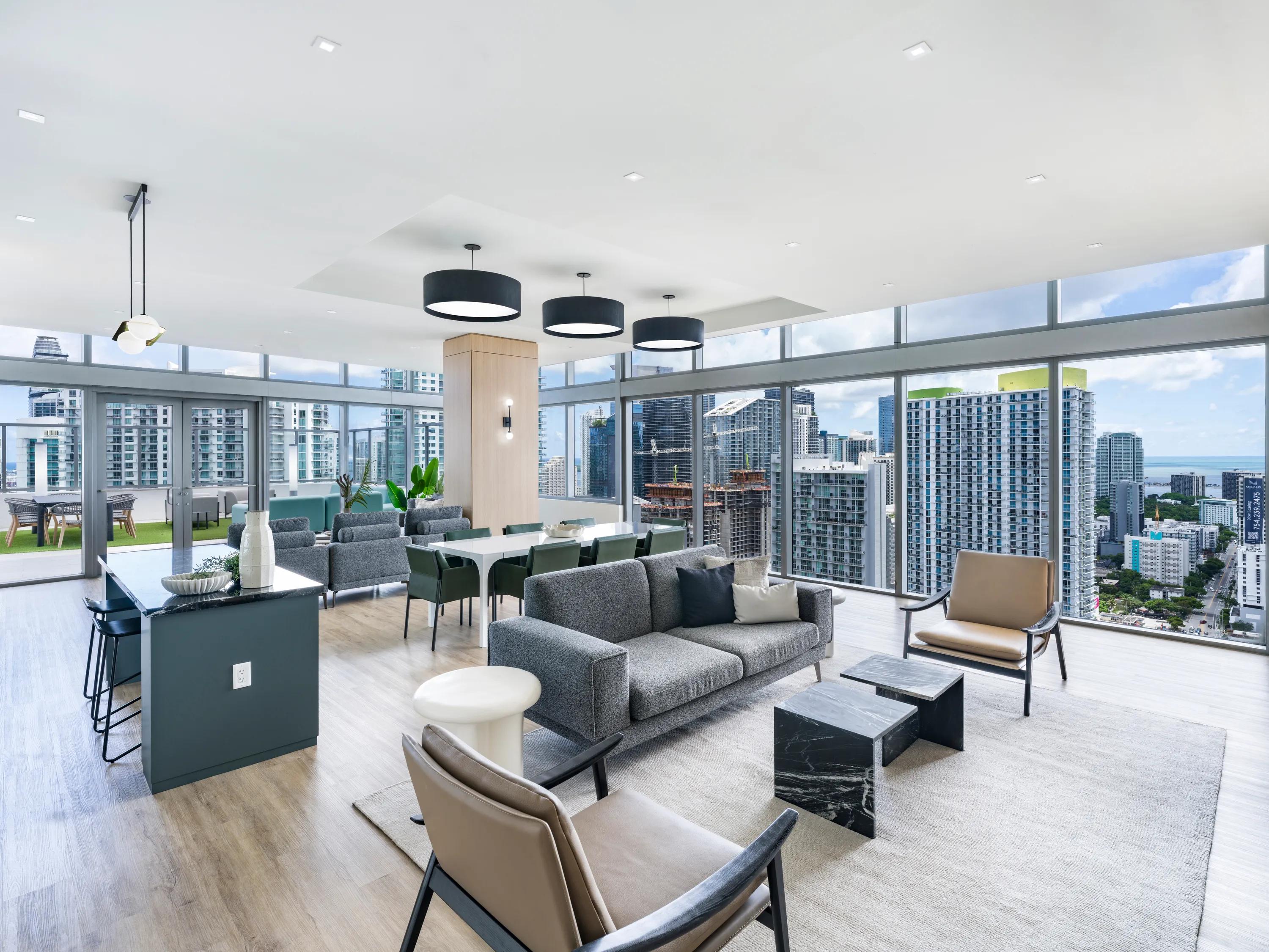 social room with seating areas resident lounge modera riverside apartment homes for rent in miami fl