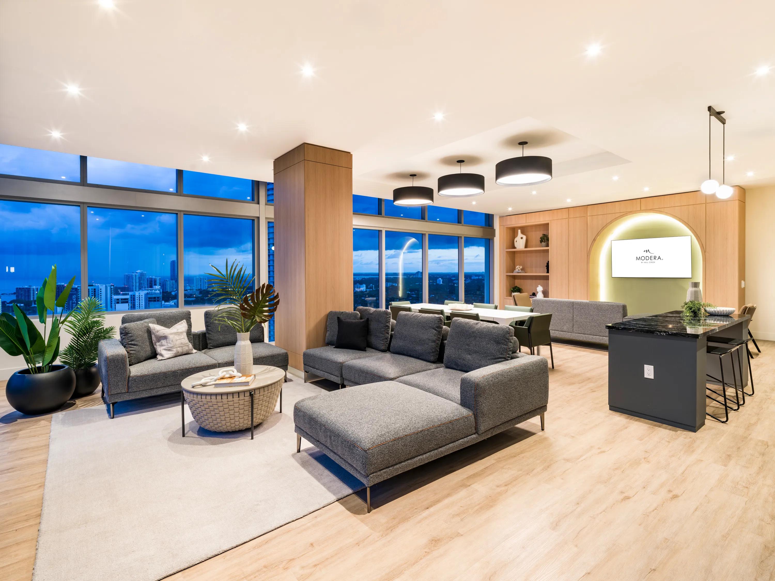 resident lounge with couch seating and television modera riverside apartment homes for rent in miami fl