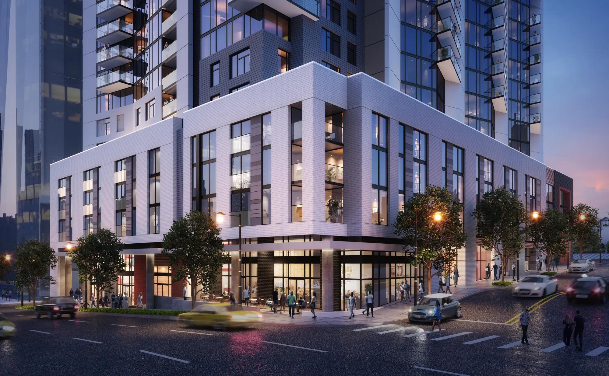 street level view on corner of apartment building at dusk modera mcgavock apartment homes for rent in nashville tn