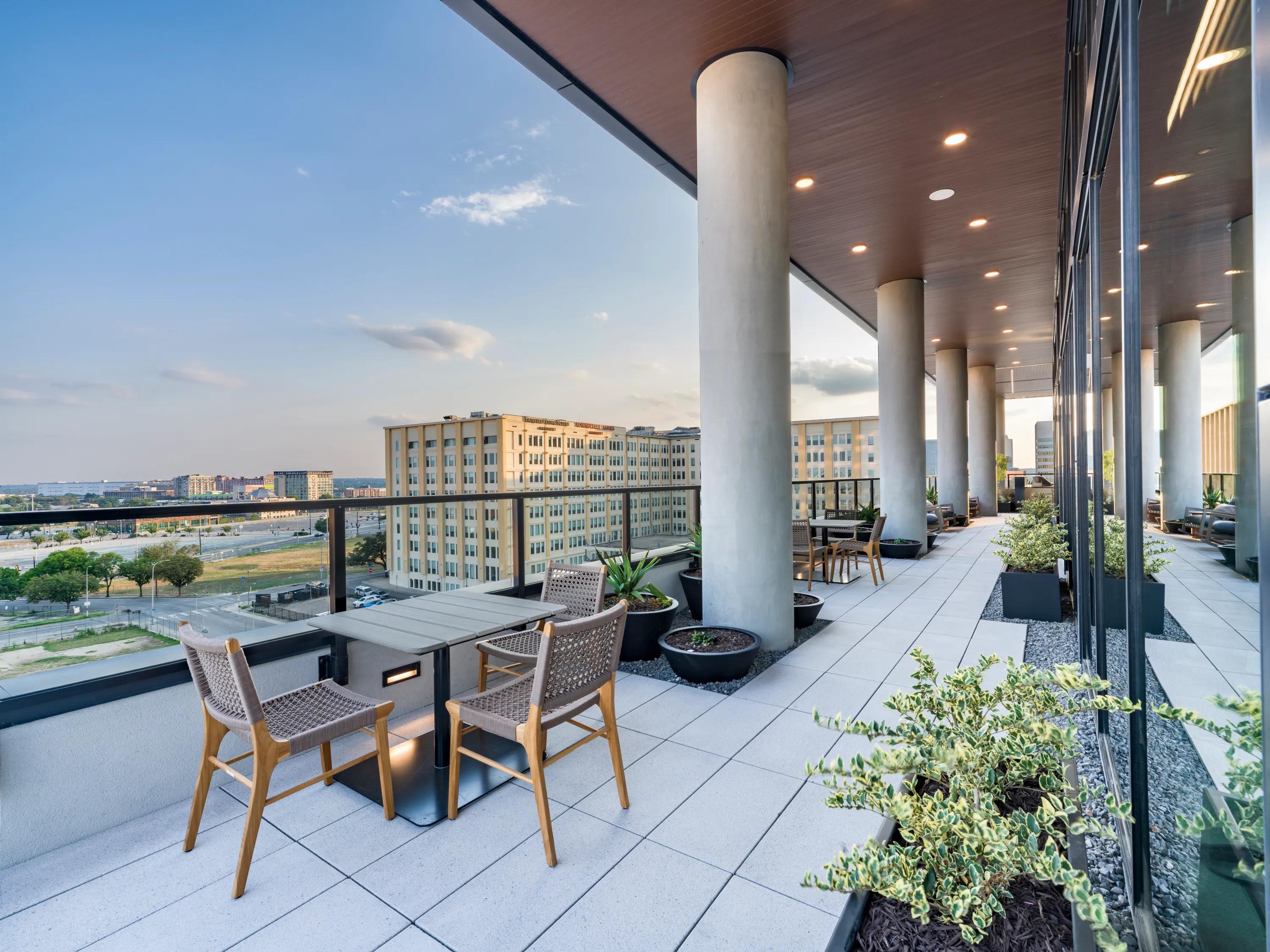 outdoor space with tables and bbq city views modera st paul apartment homes for rent