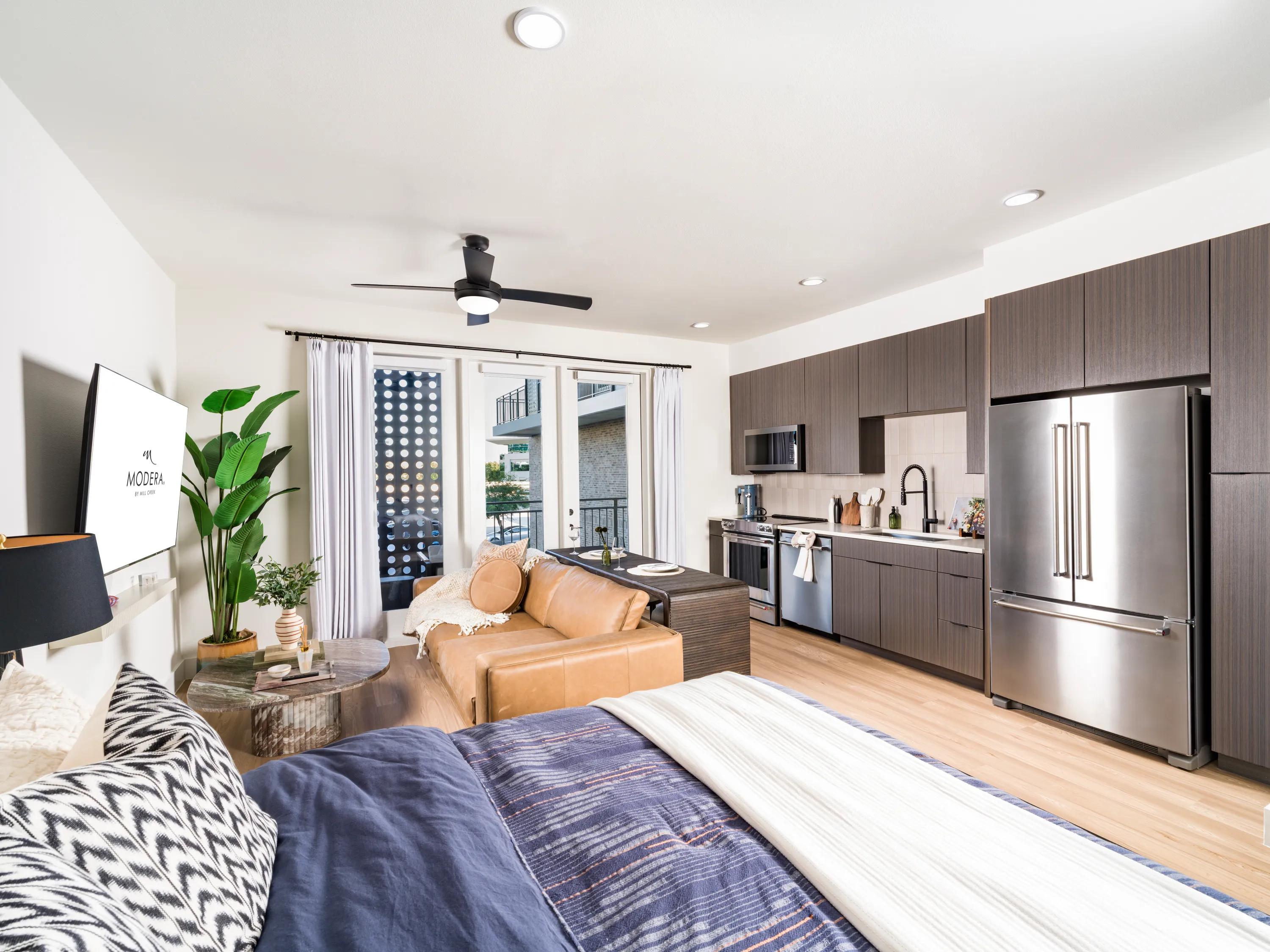 studio floor plan layout with dark kitchen cabinetry and stainless steel appliances modera kierland apartments homes for rent in scottsdale z