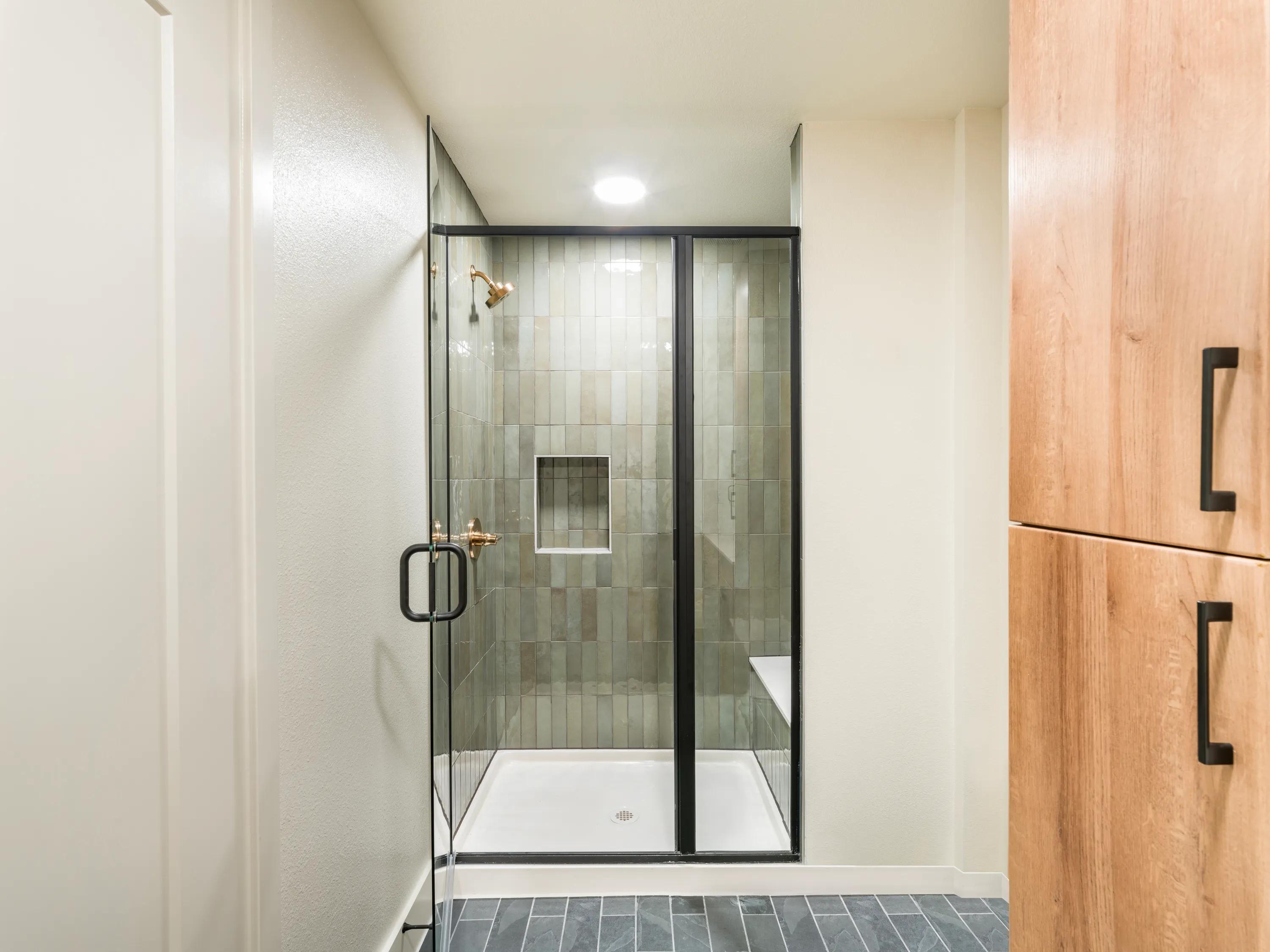 bathroom with glass enclosed shower modera st. paul apartment homes for rent in dallas tx