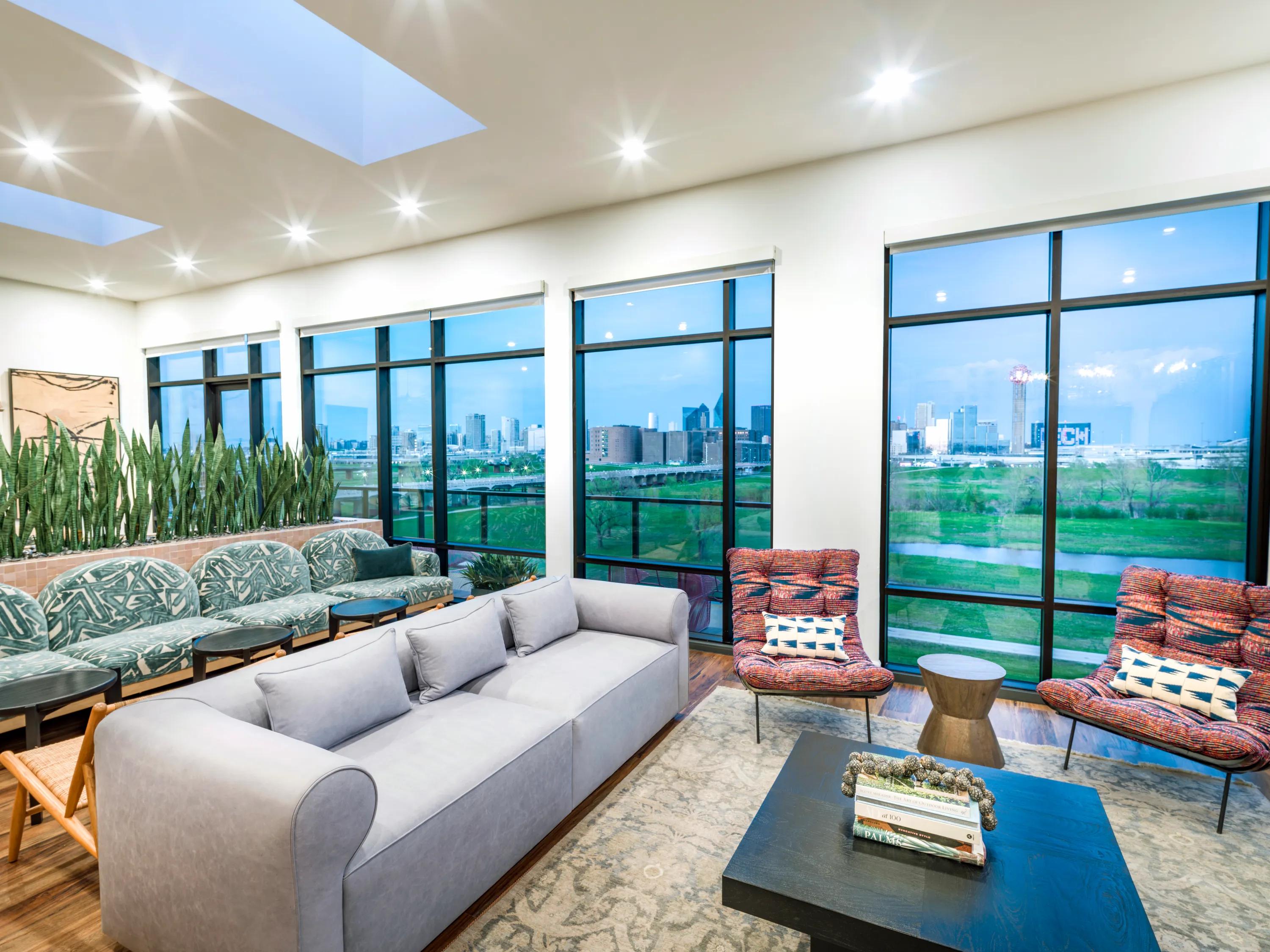 clubhouse with dallas city views from large windows modera trinity apartment homes for rent in dallas texas
