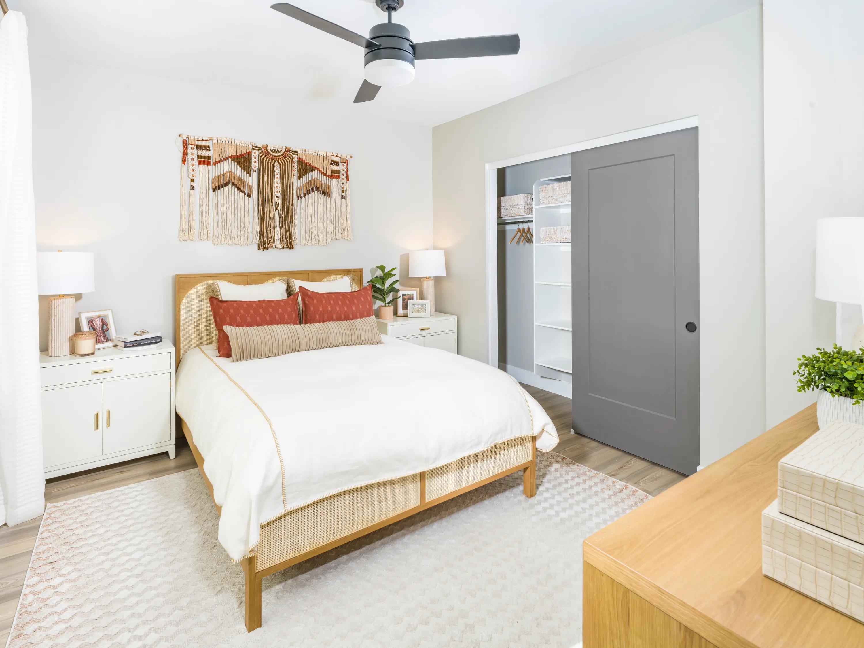 bedroom with adjacent closet and ceiling fan modera reserve apartment homes for rent in scottsdale az
