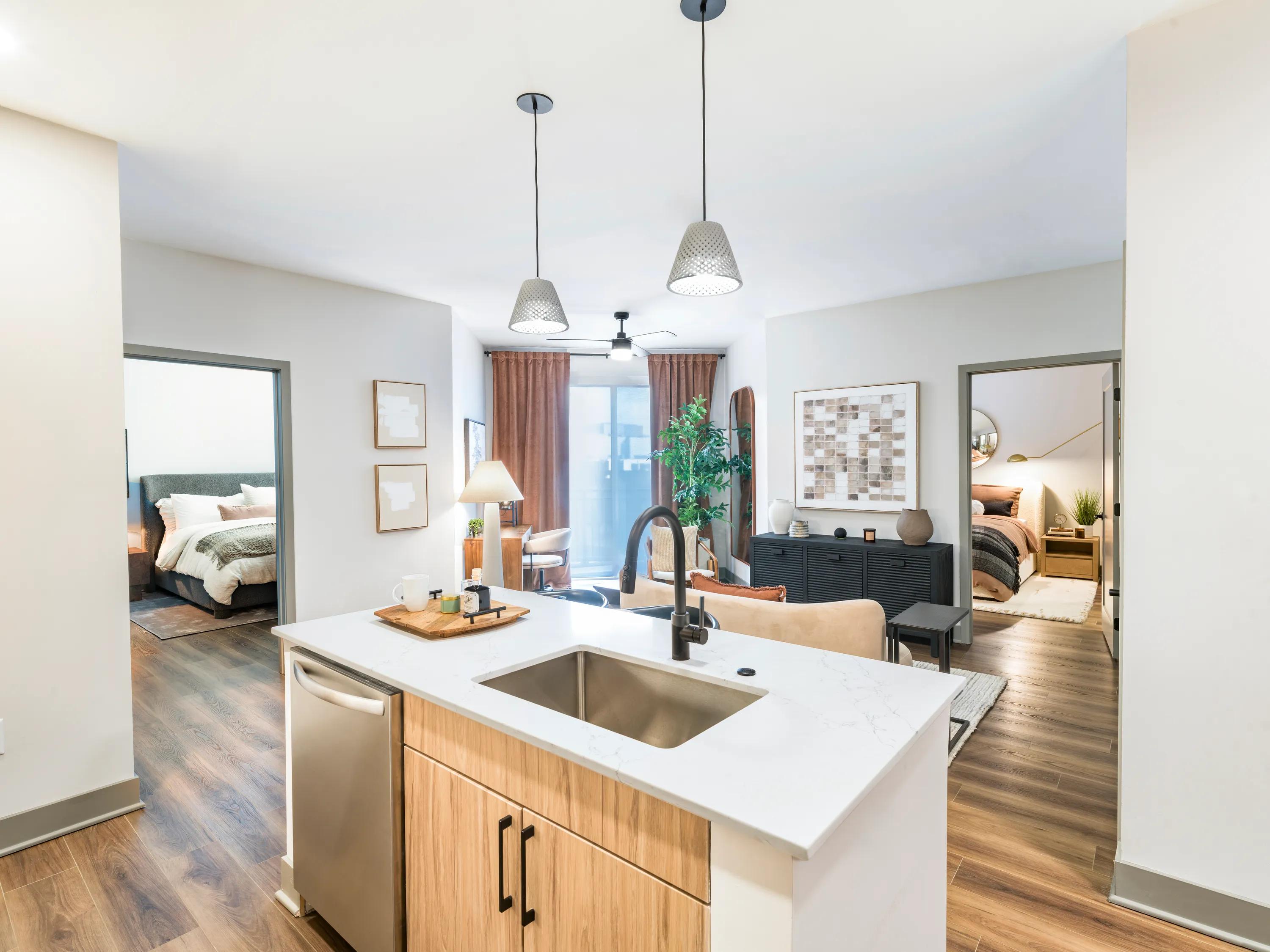 premium kitchen with stainless steel appliances and white cabinetsmodera riverview apartment homes for rent in tn rendering