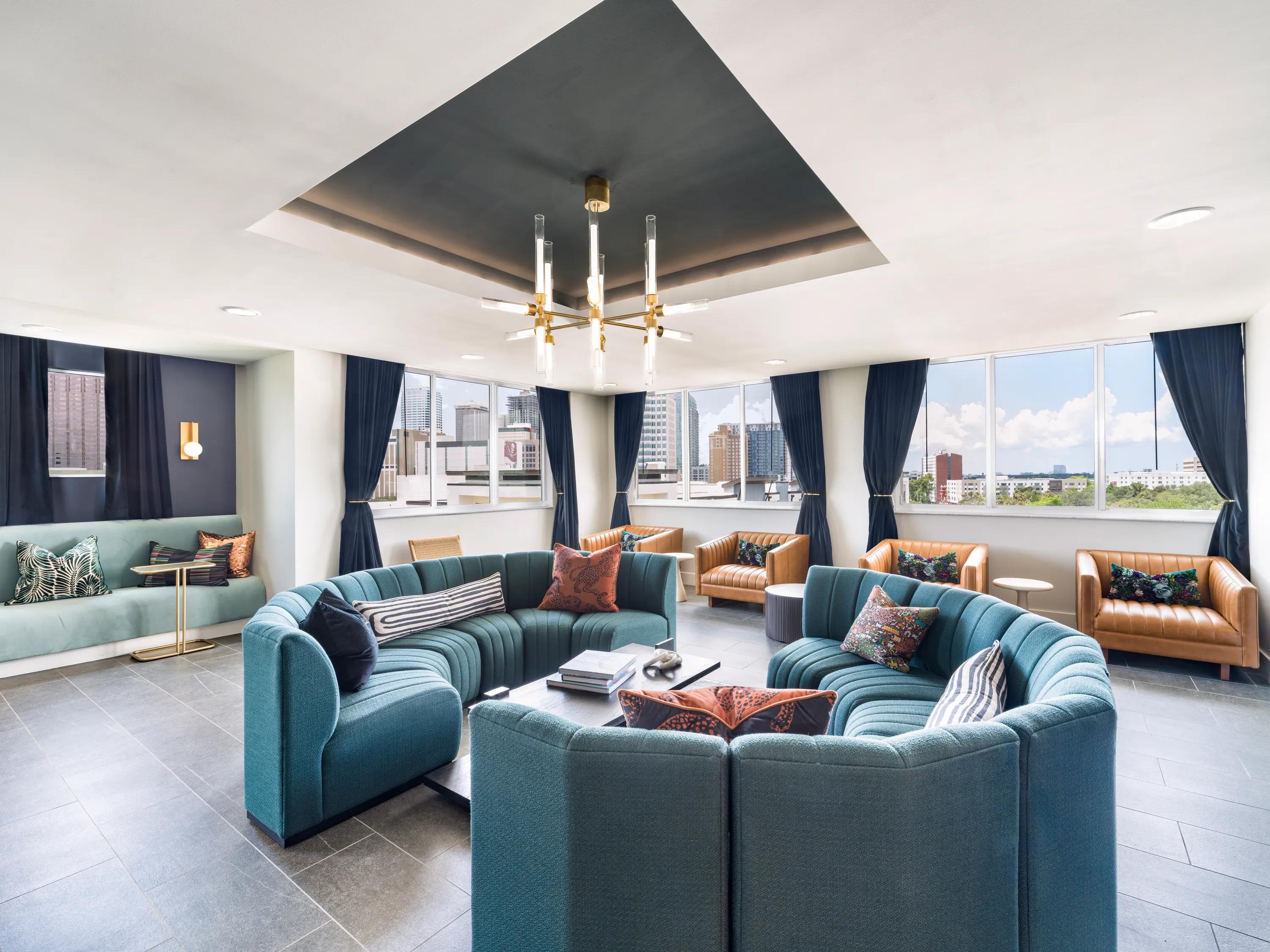 Expansive clubroom with gathering space and comfortable seating