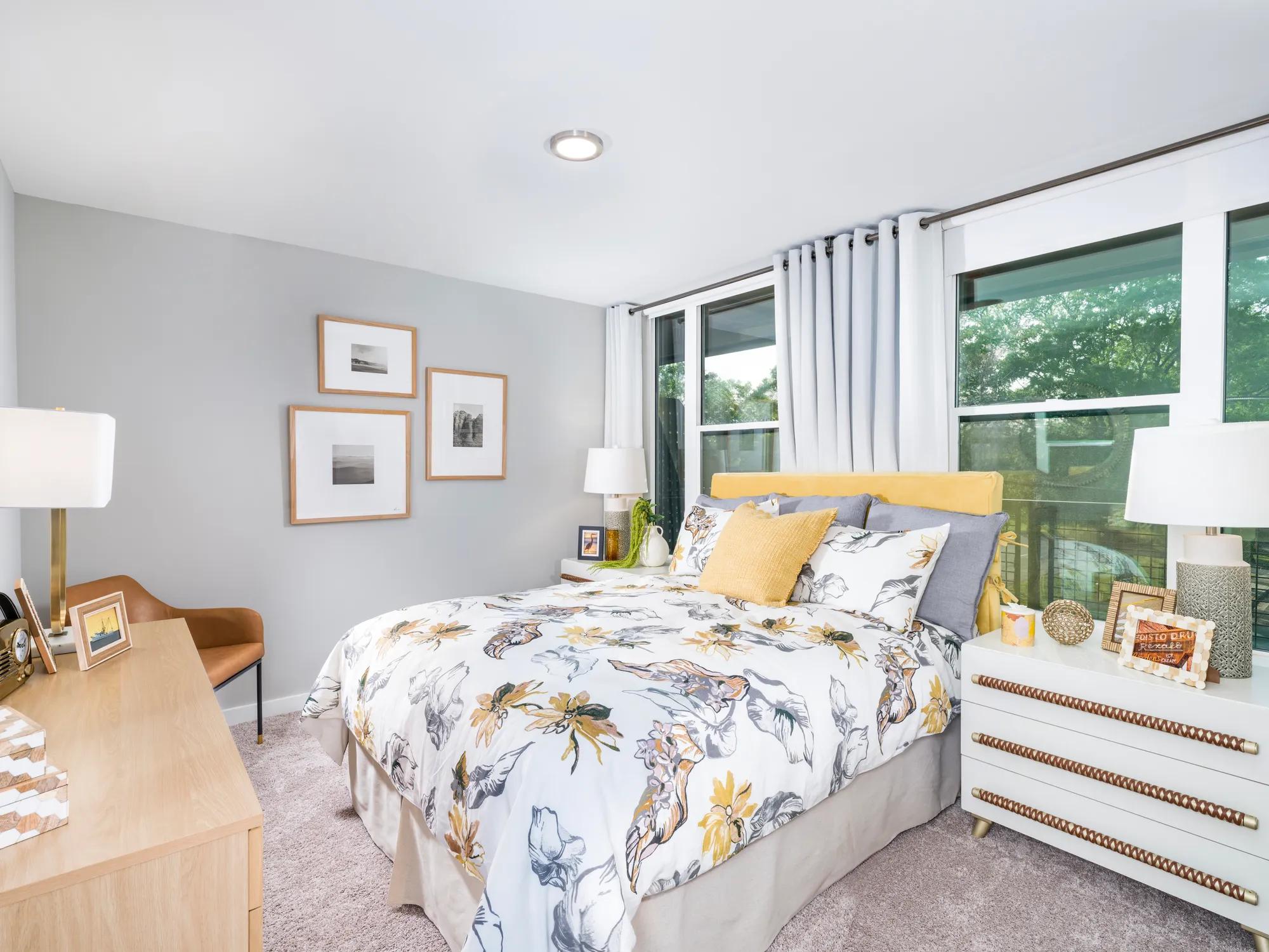 large bedroom with numerous windows and ample natural light modera loso apartment homes for rent in charlotte nc
