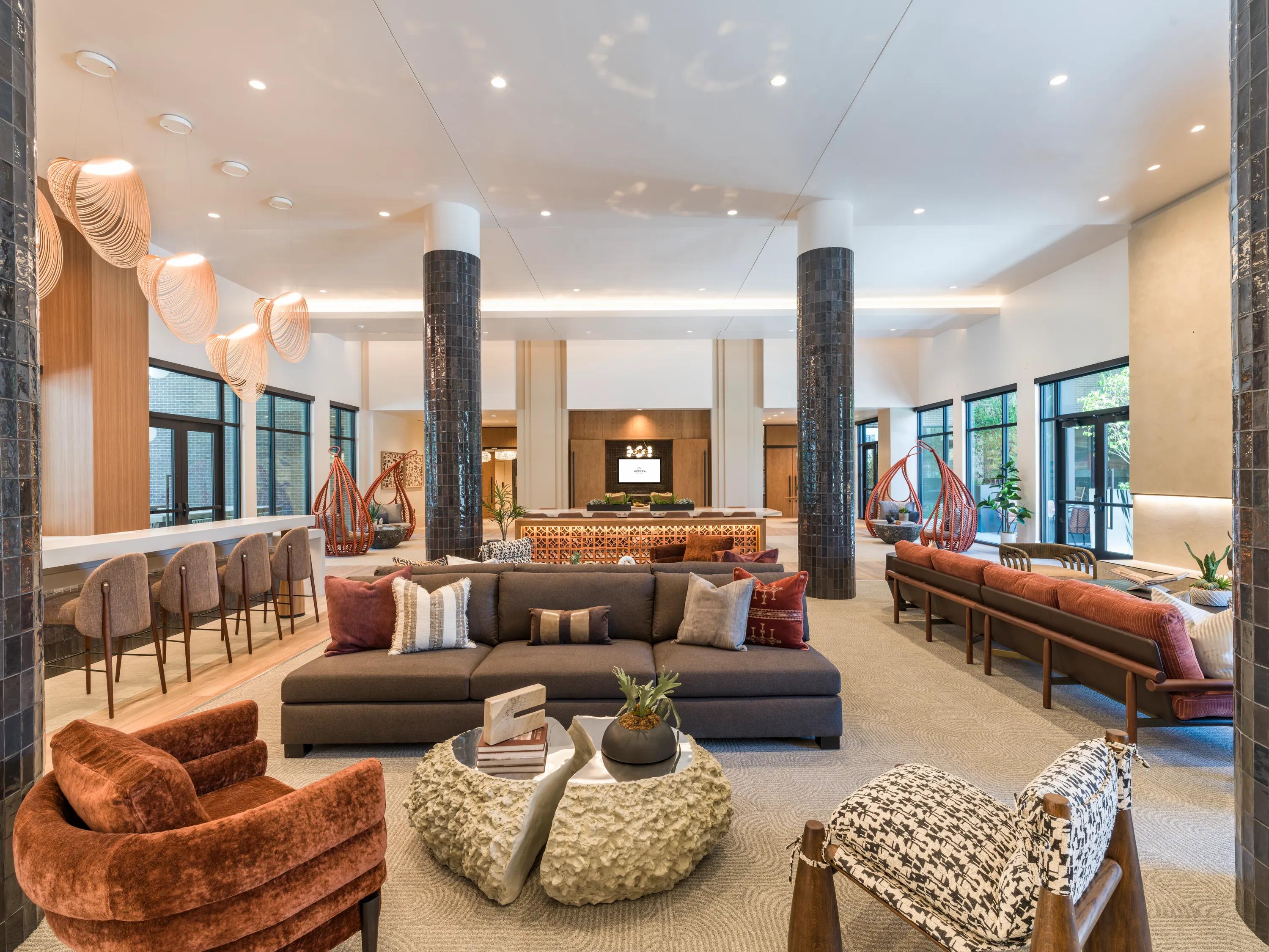 clubroom with high end finishes and large windows modera reserve apartment homes for rent in scottsdale az