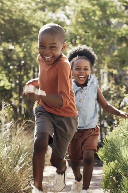 young family kids running outside modera chandler az