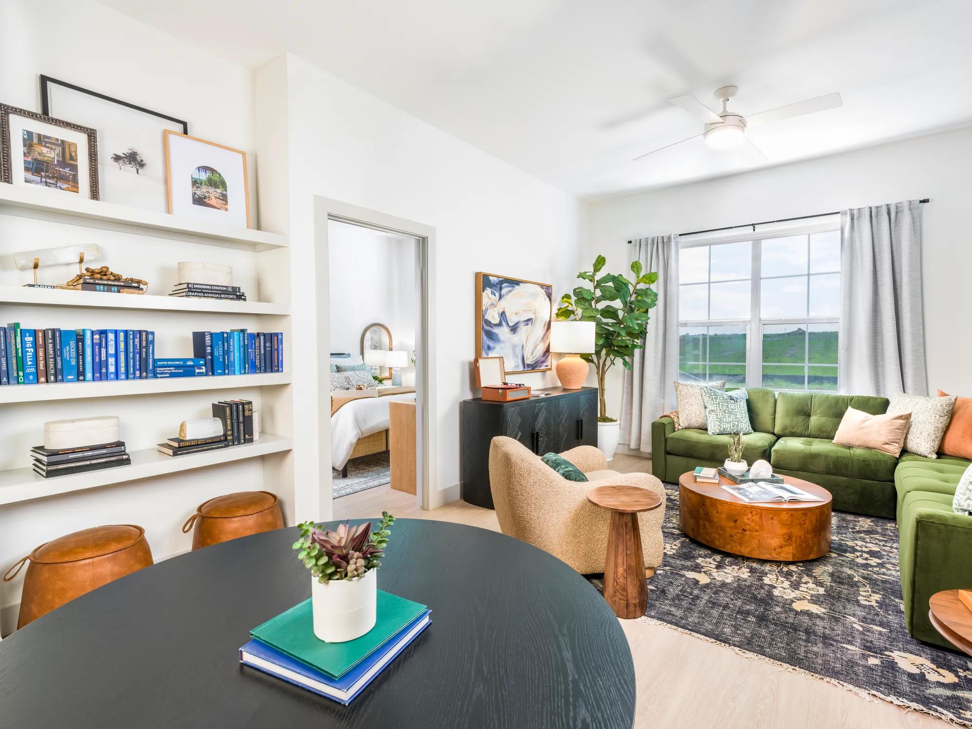 dining and living area open floor plan leading onto bedroom modera mckinney ridge apartment homes for rent in tx