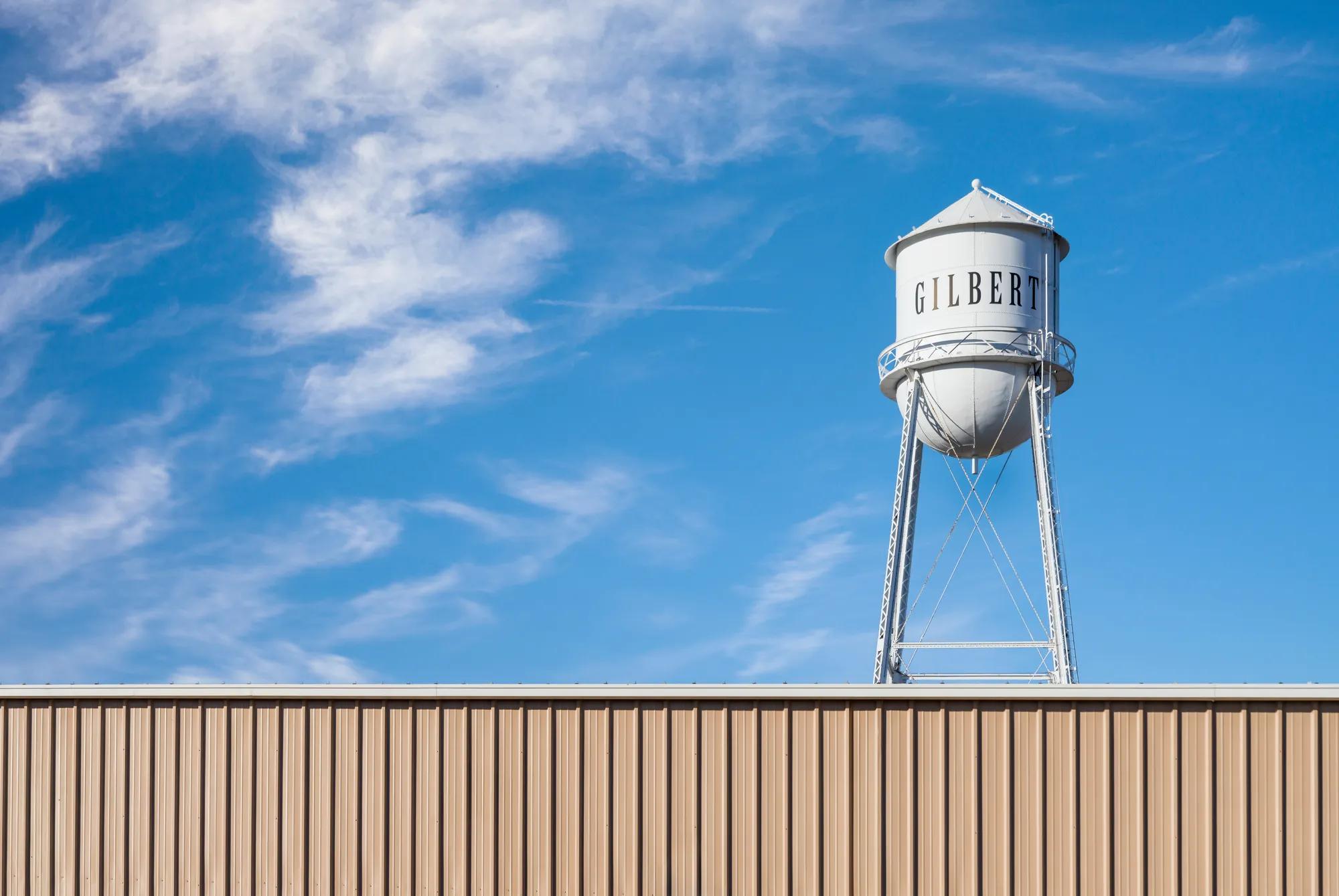 gilbert water tower on blue sky day at modera higley commons apartment homes for rent in gilbert az