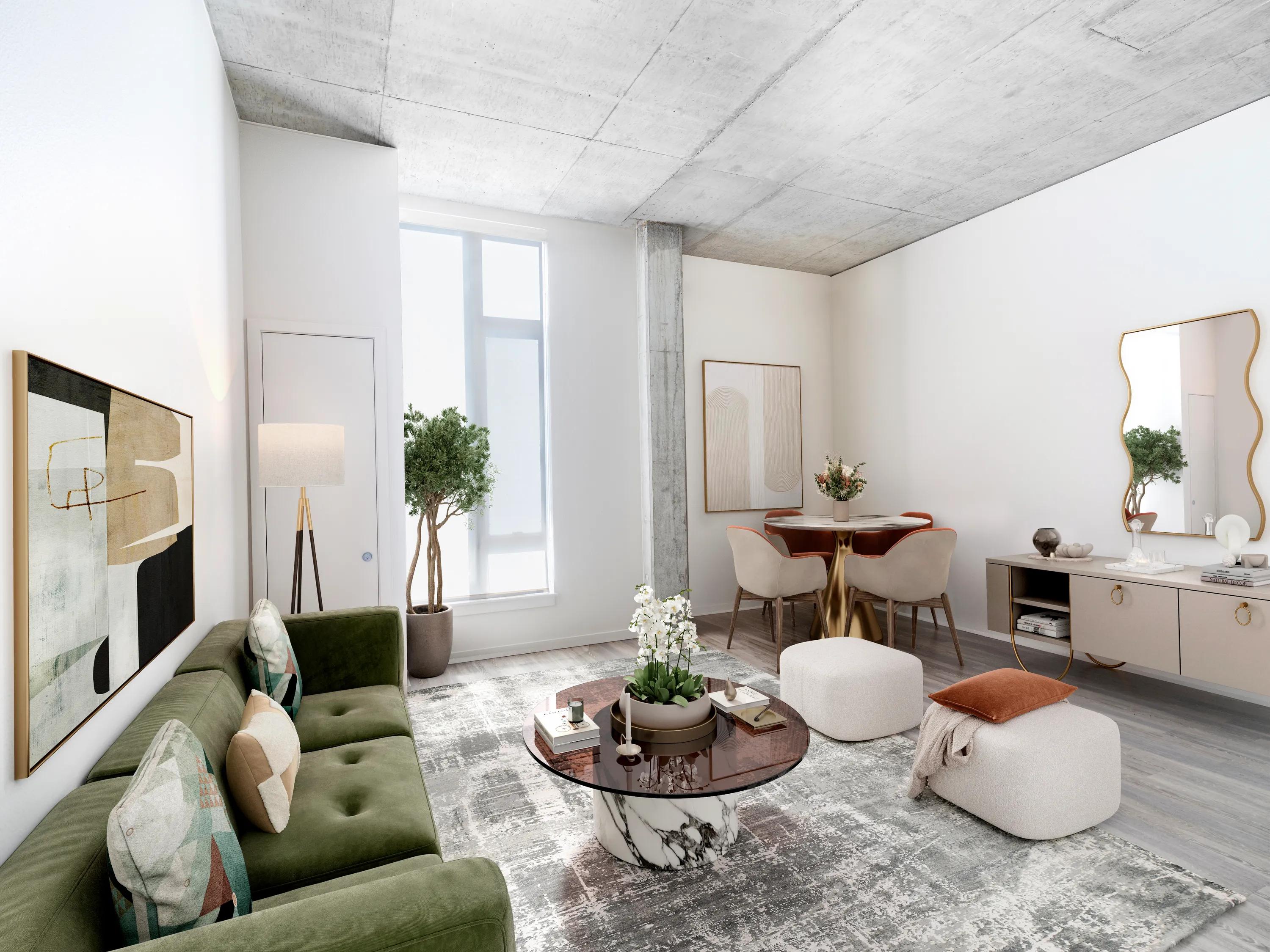 Furnished living area with expansive windows modera pearl apartments in portland or
