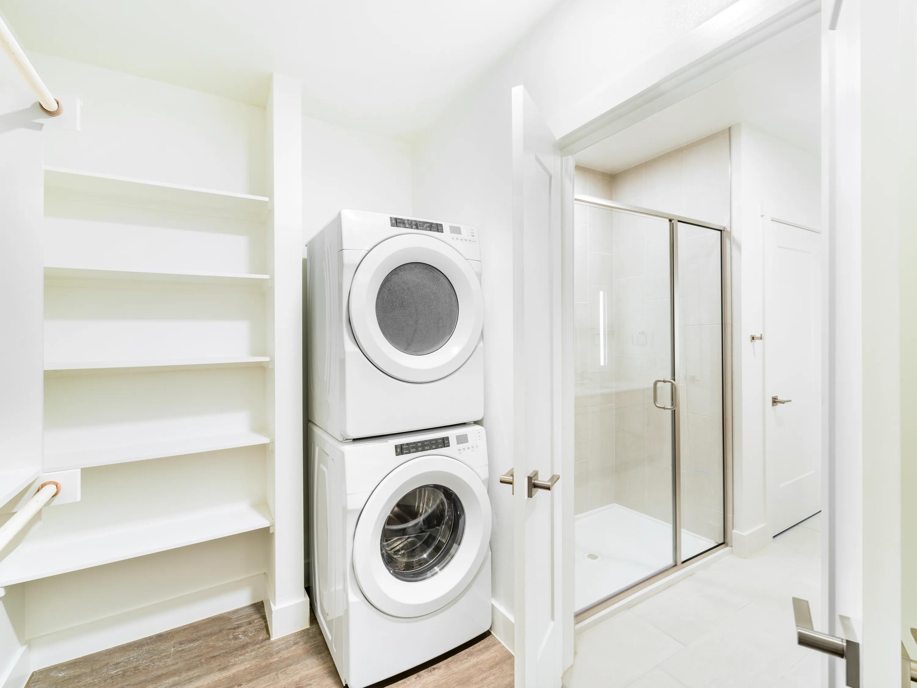 In-home laundry with stacked washer and dryer modera trailhead apartment homes for rent in dallas texas