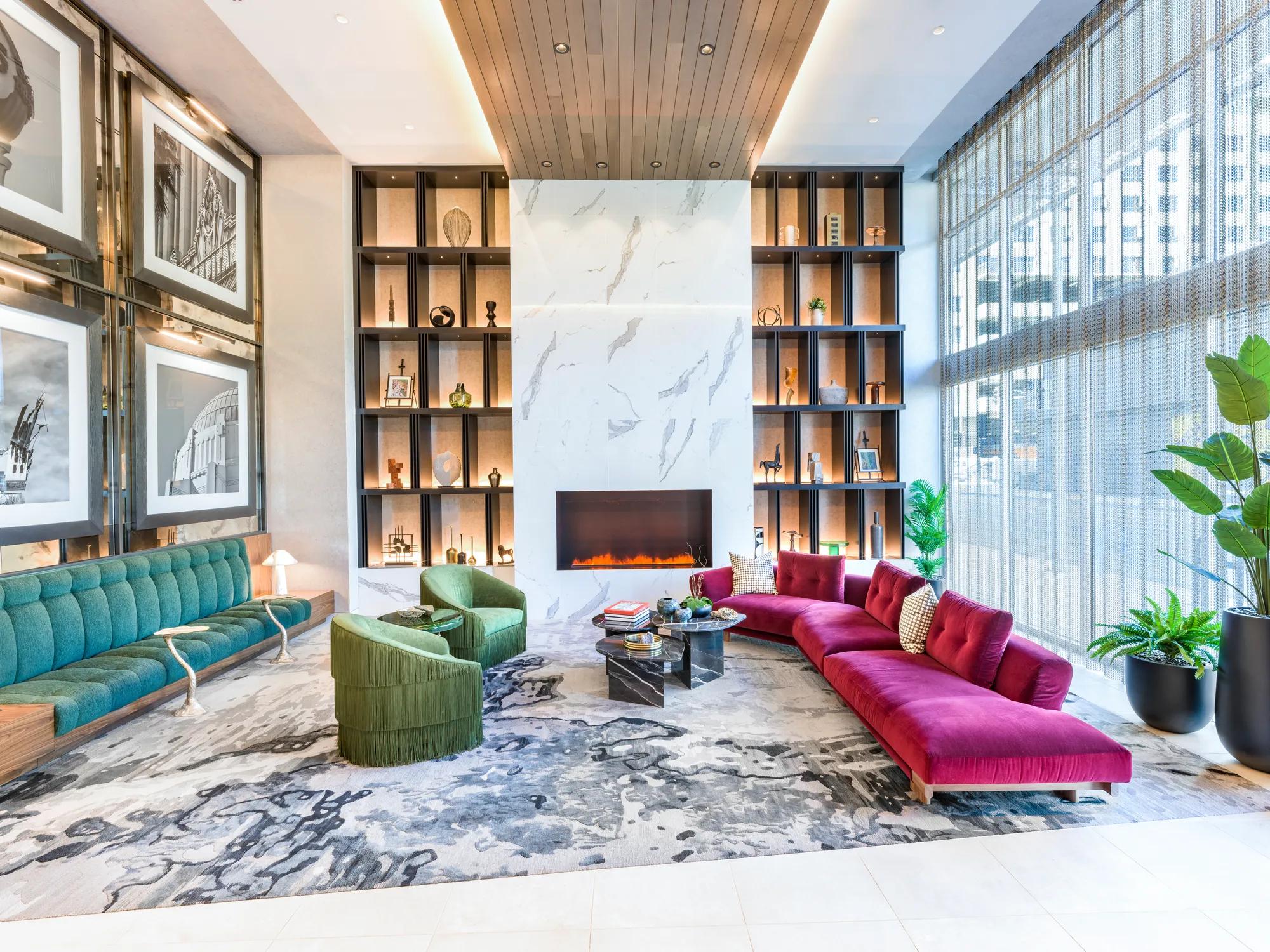 clubroom and lounge area with tvs modera argyle apartments for rent in los angeles ca