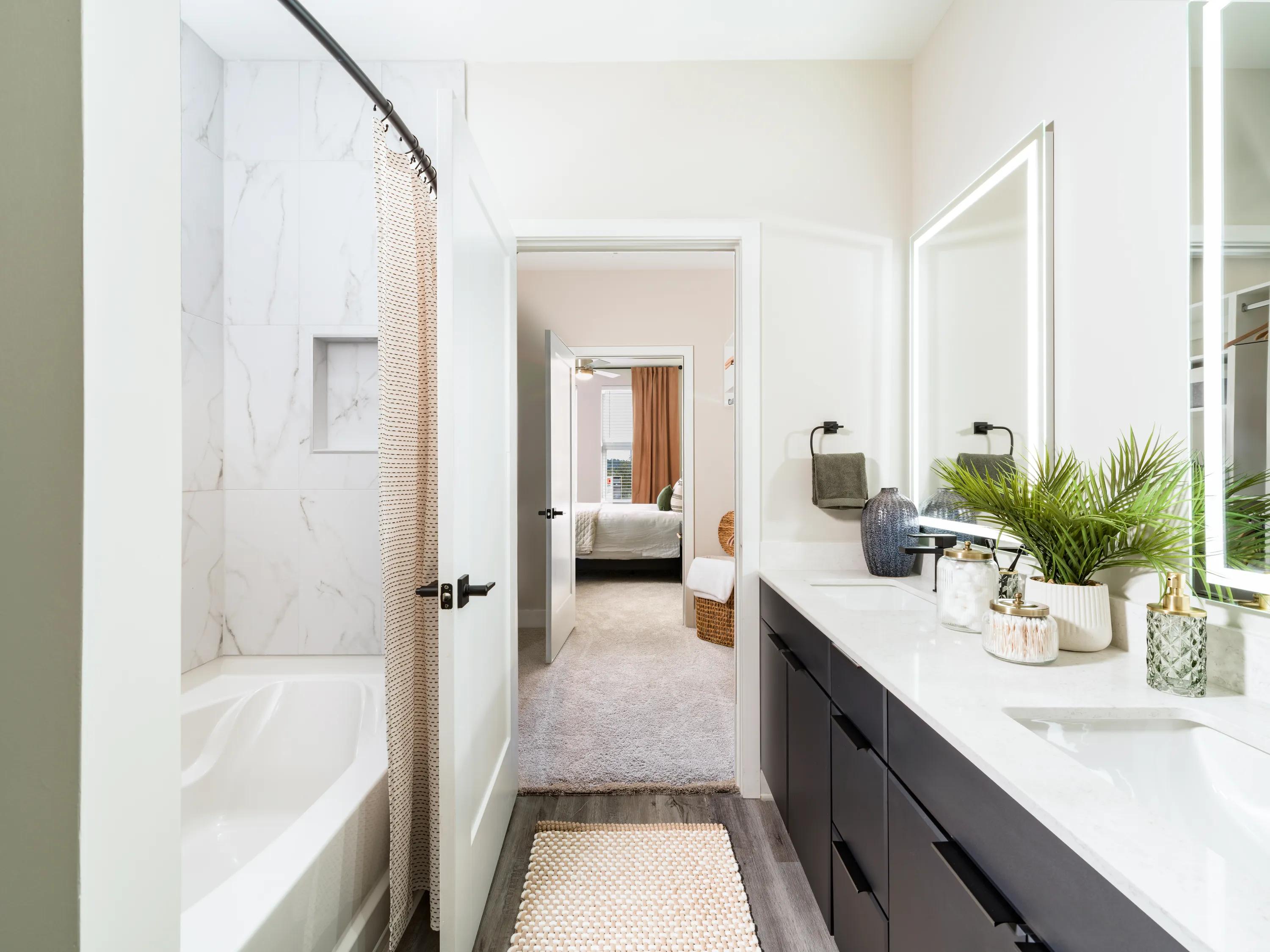 dual vanity bathroom with dark cabinets modera westside trail apartment homes for rent in atlanta ga