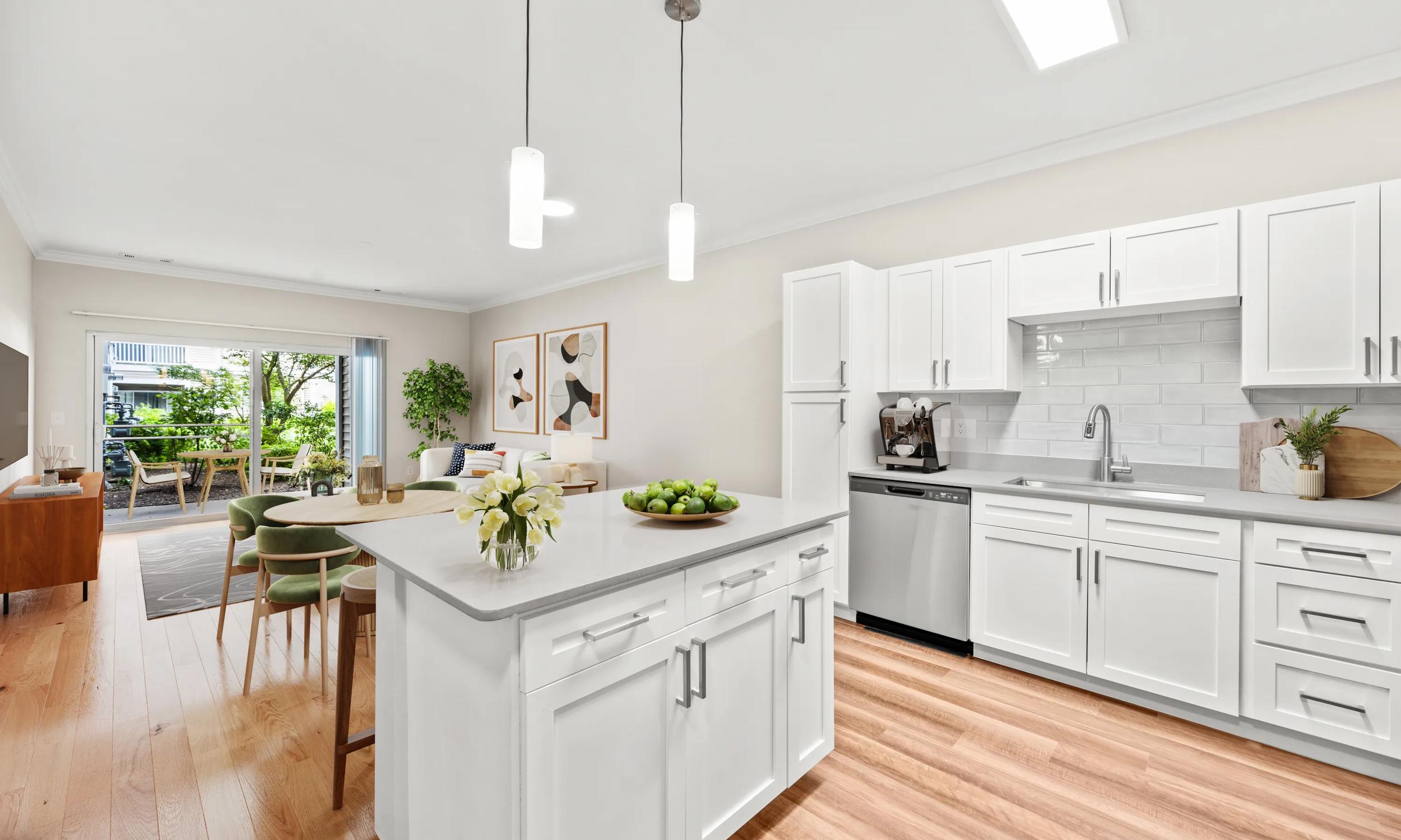 the avens at dedham apartments near boston kitchen with tile and living area