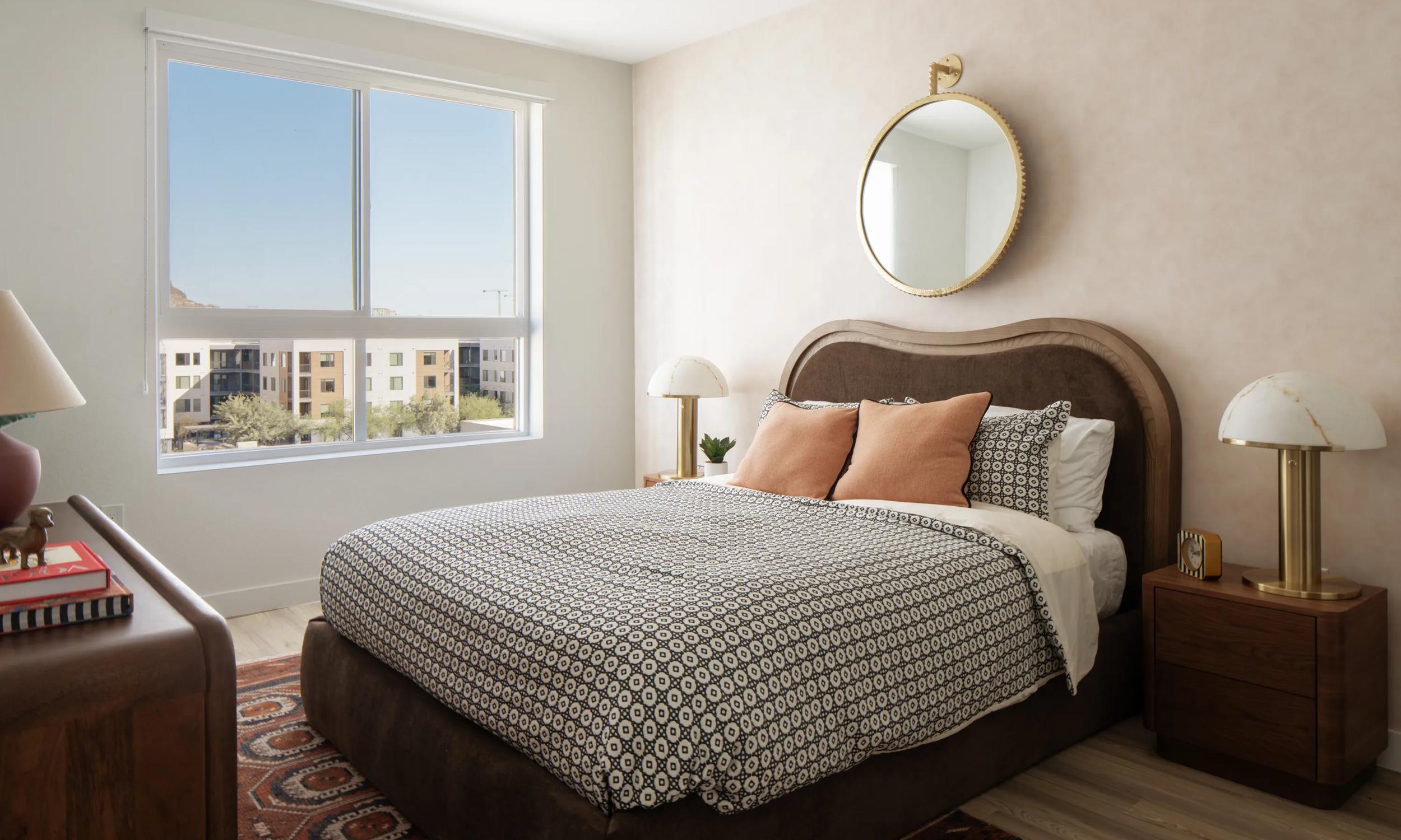 modern bedroom with large window modera rio salado apartment homes for rent in tempe az