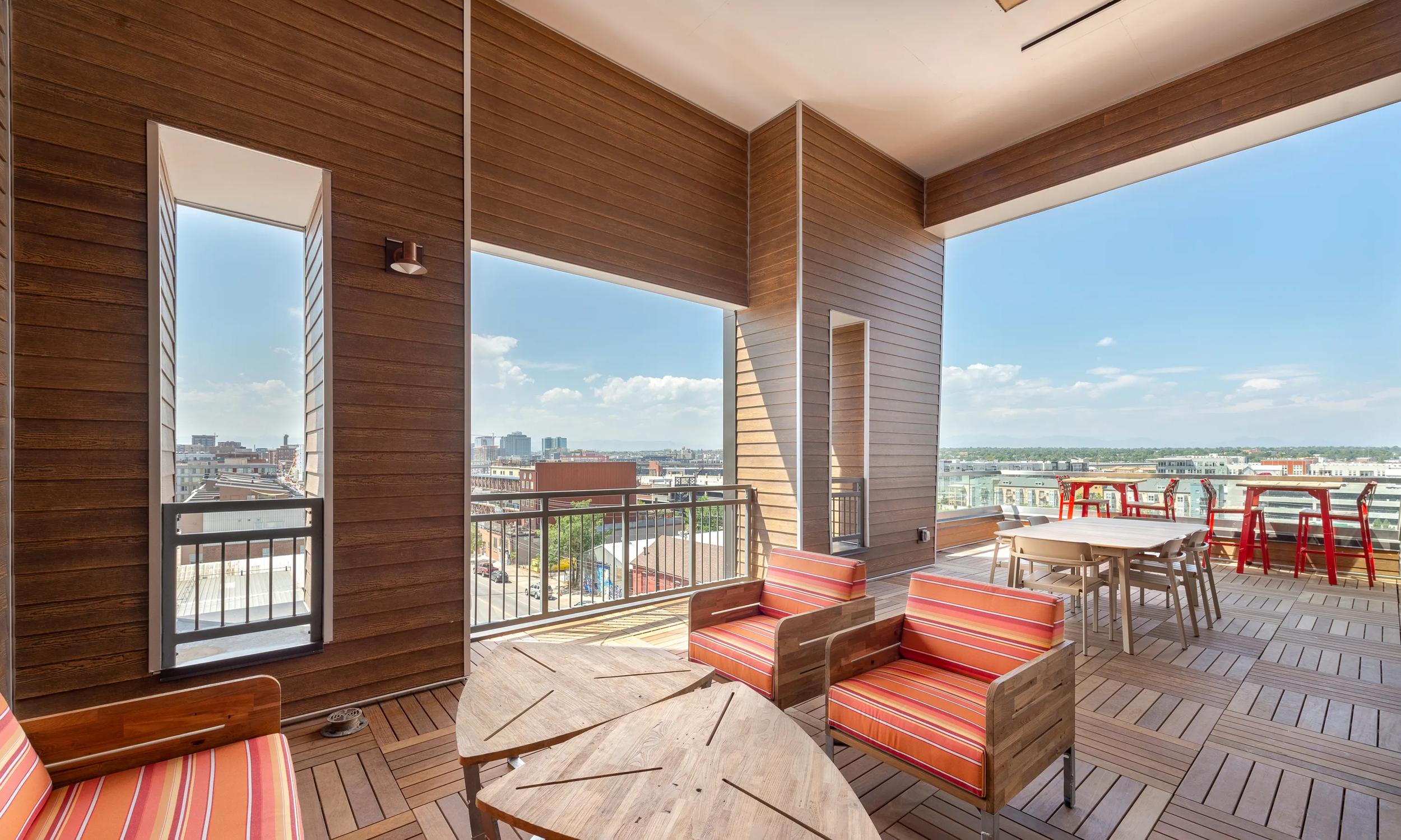rooftop lounge with views of downtown denver modera river north apartments in denver co