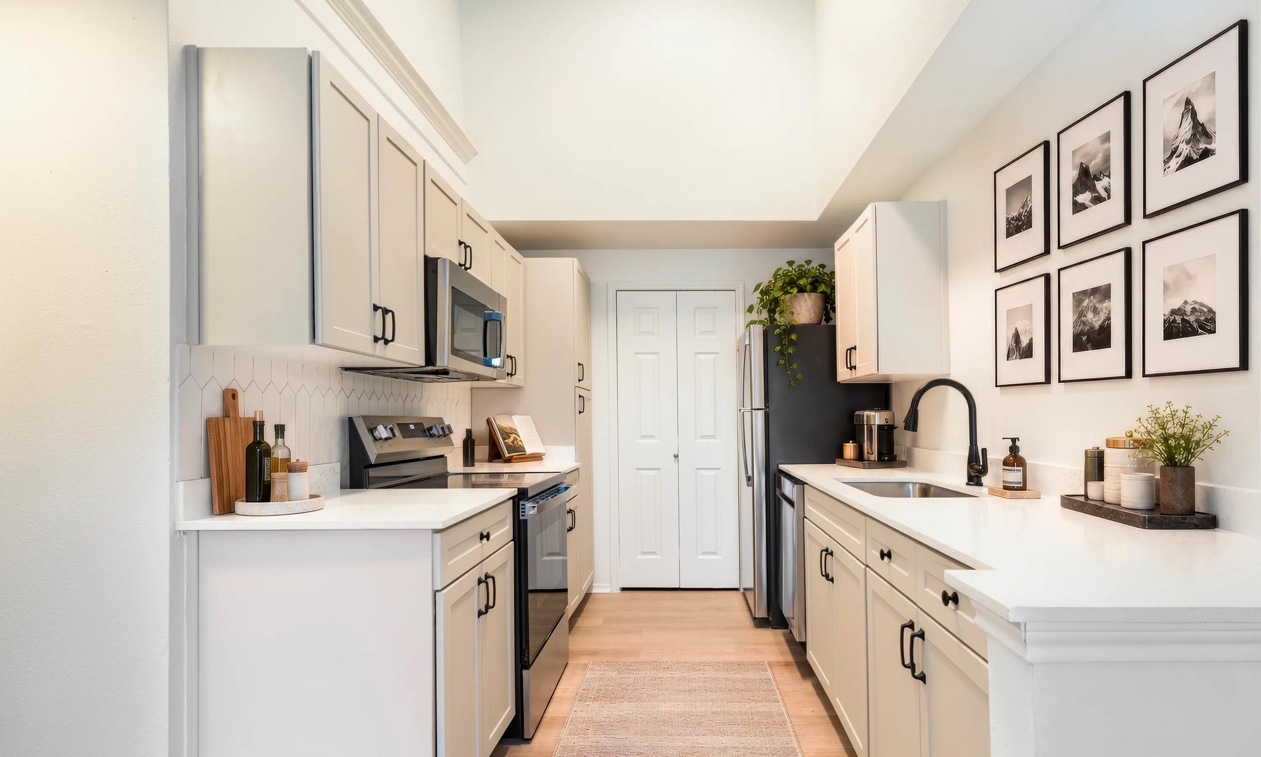 alister sunset valley interior kitchen with stainless steel appliances apartments in austin tx