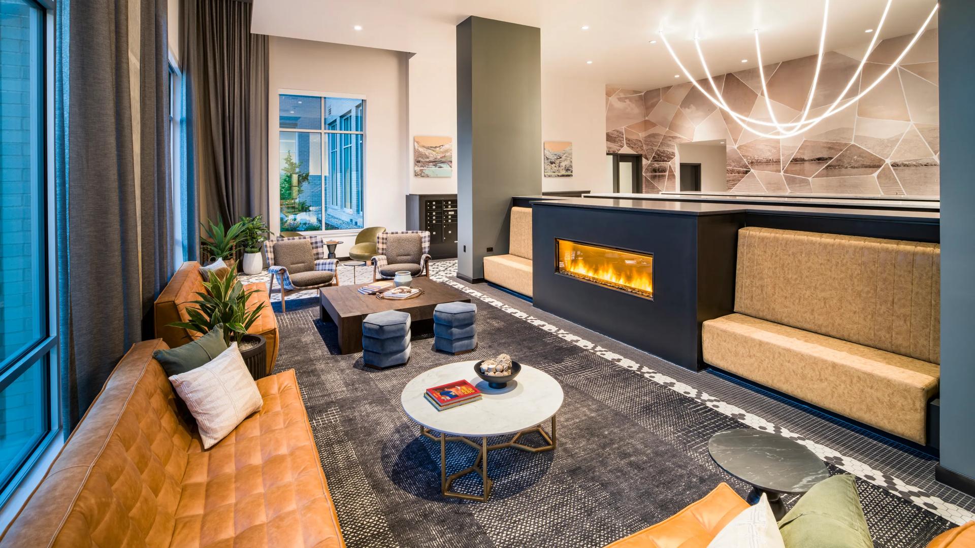 gradient overlay clubroom rendering with seating modera shoreline apartment homes for rent in wa