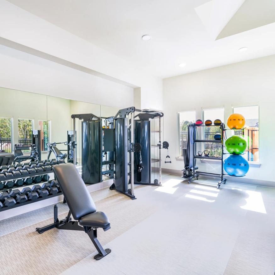 man working out on stationary bike beckett west fork apartment homes for rent in tx