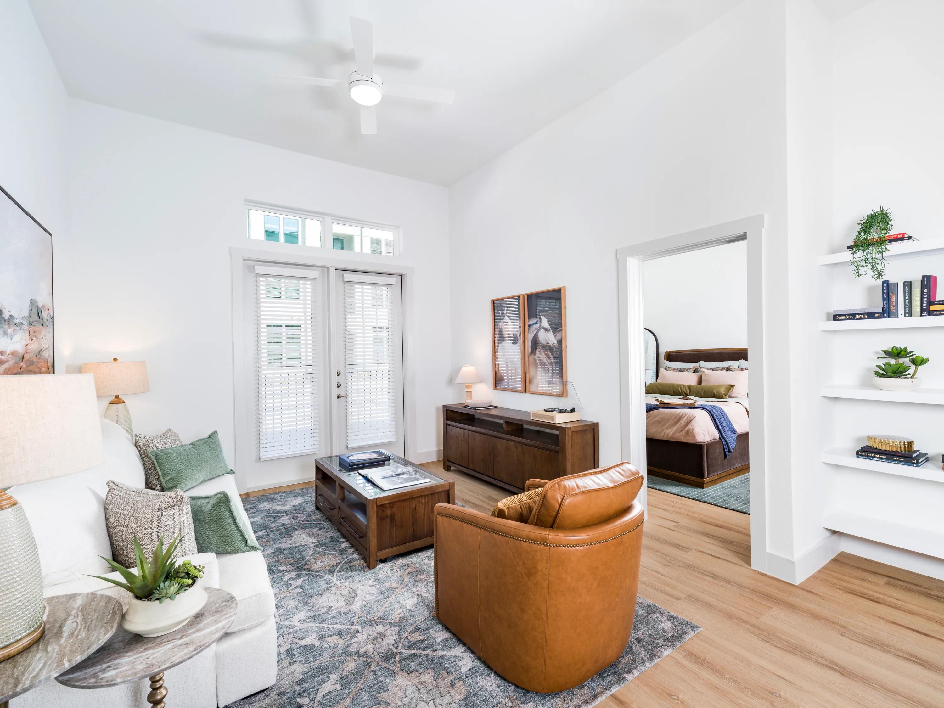open living area with high ceilings modera walsh heights apartments aledo tx