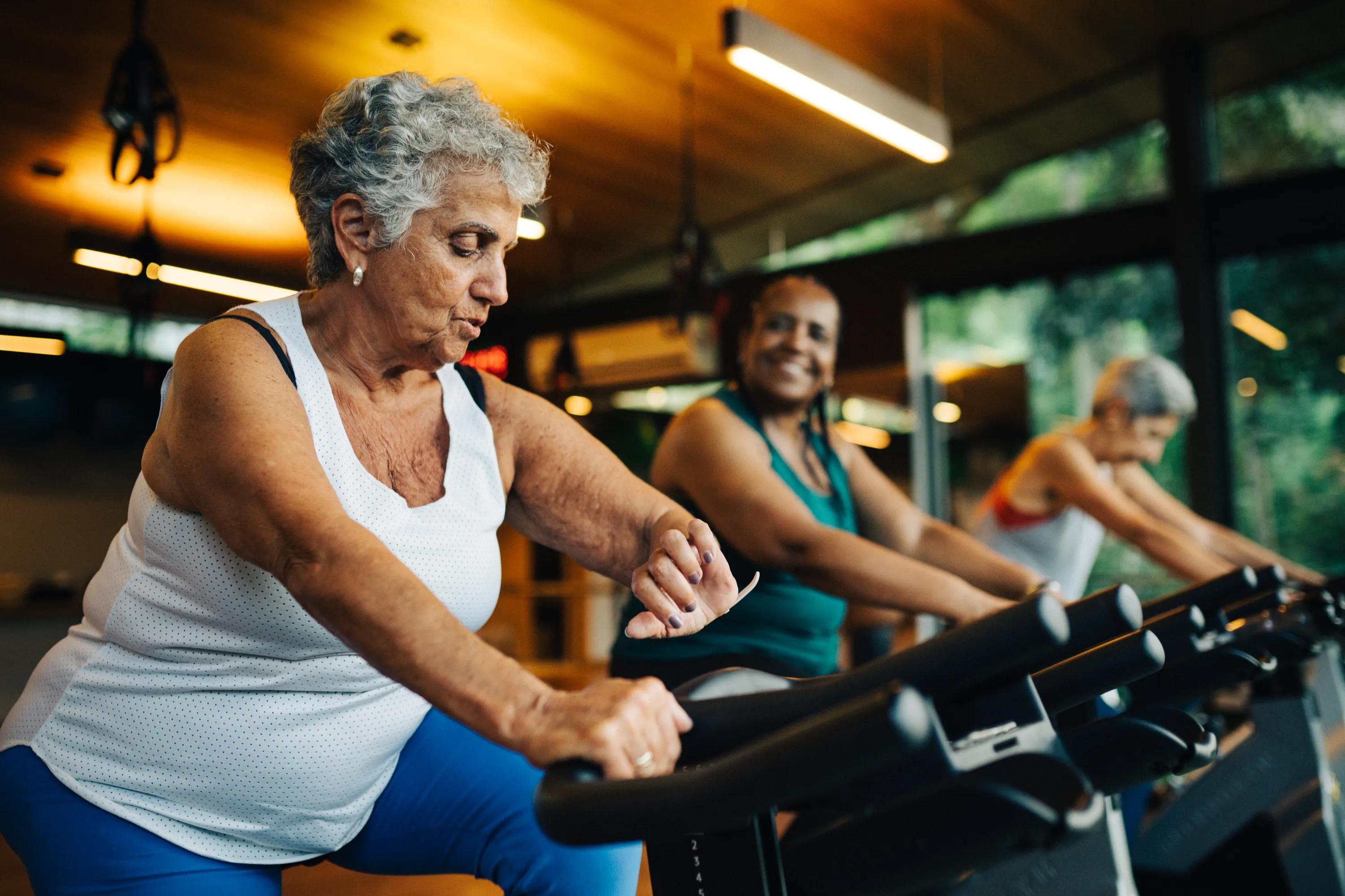 Club-quality fitness studio with TRX station and spin bikes modera second avenue apartments in denver co