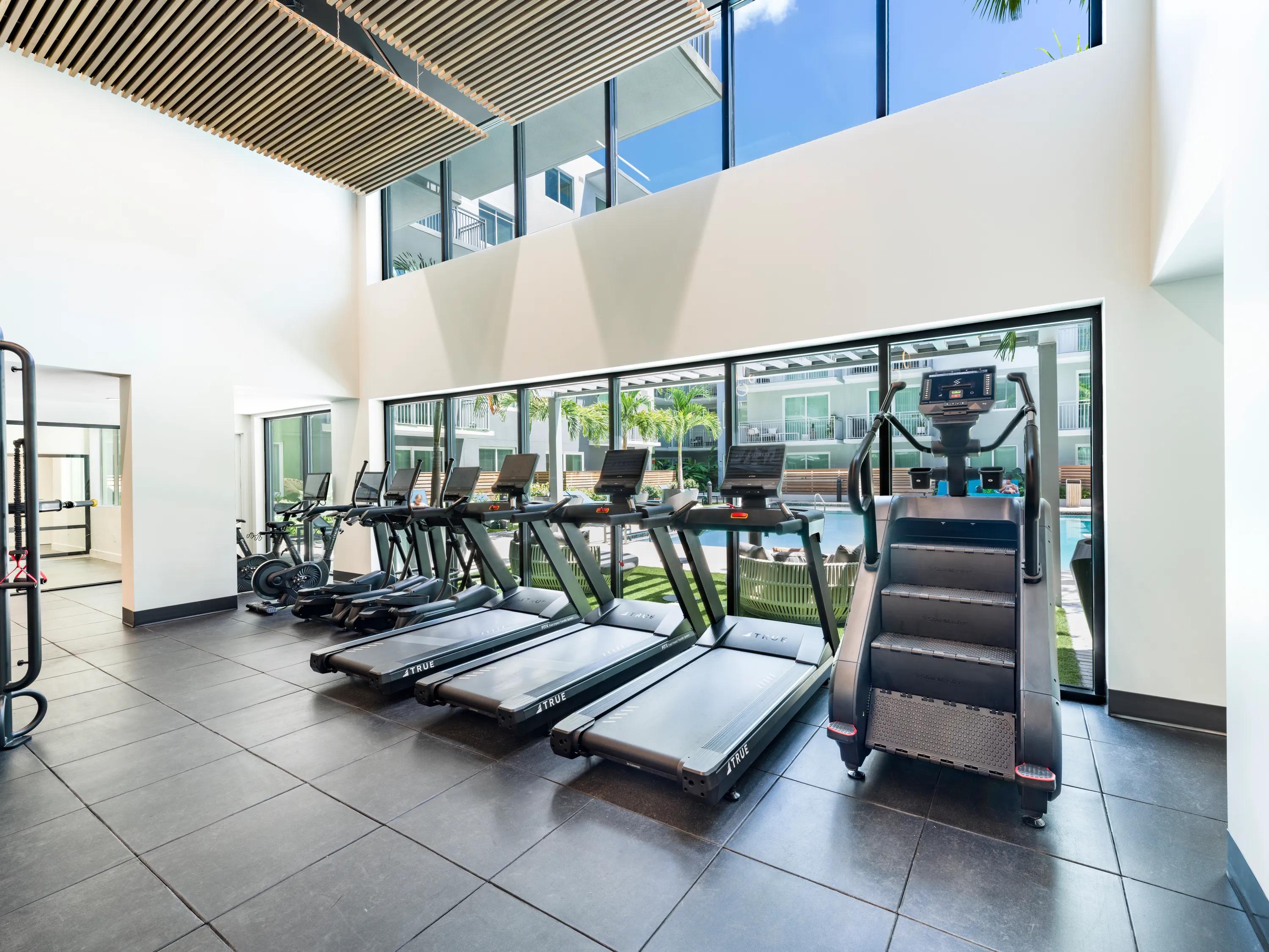 Club-quality fitness studio with spin bikes and fitness on-demand