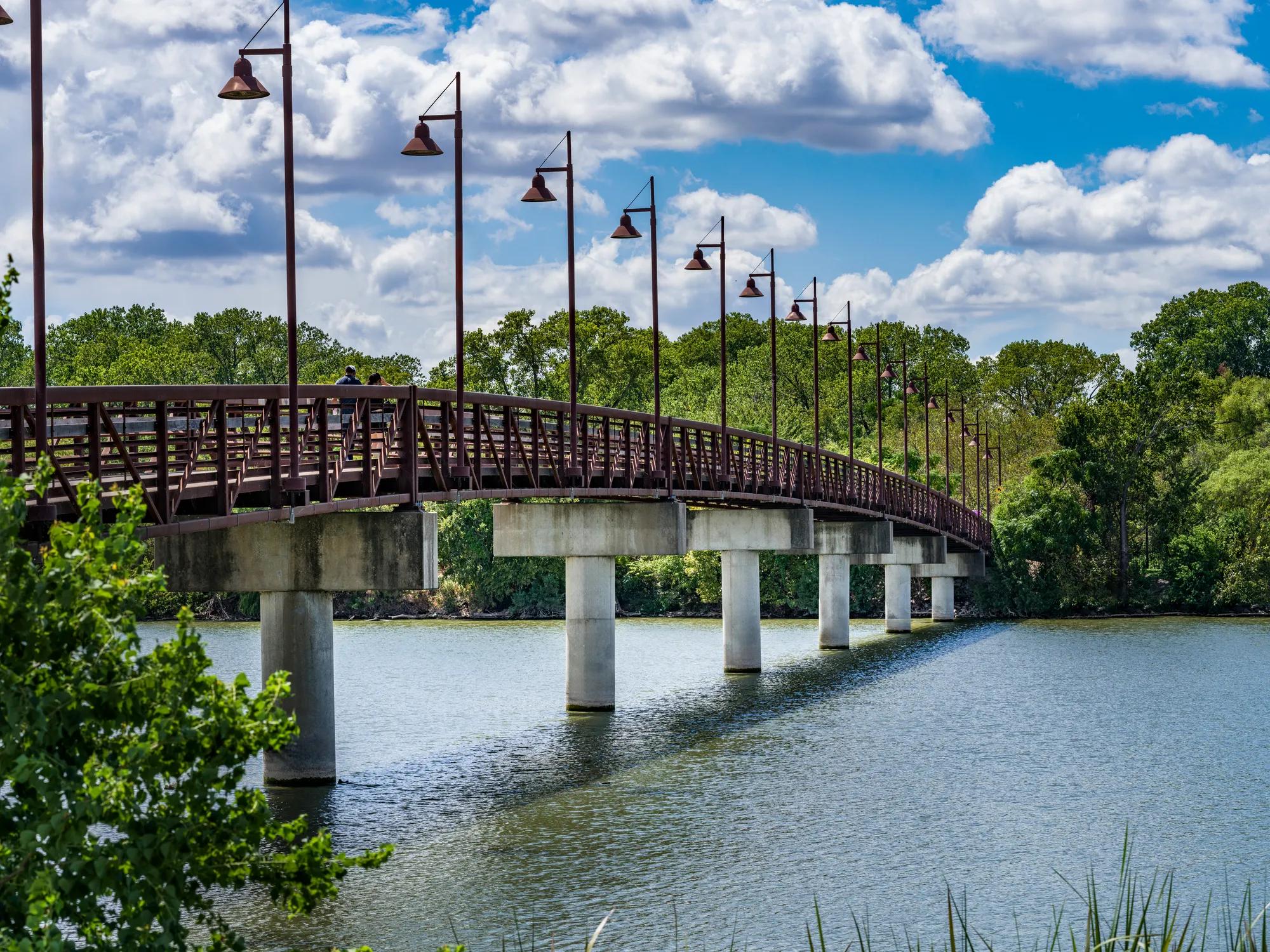 pathway over body of water modera trailhead apartment homes for rent in dallas tx
