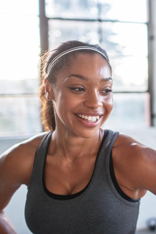 woman at gym modera georgetown apartment homes for rent georgetown tx