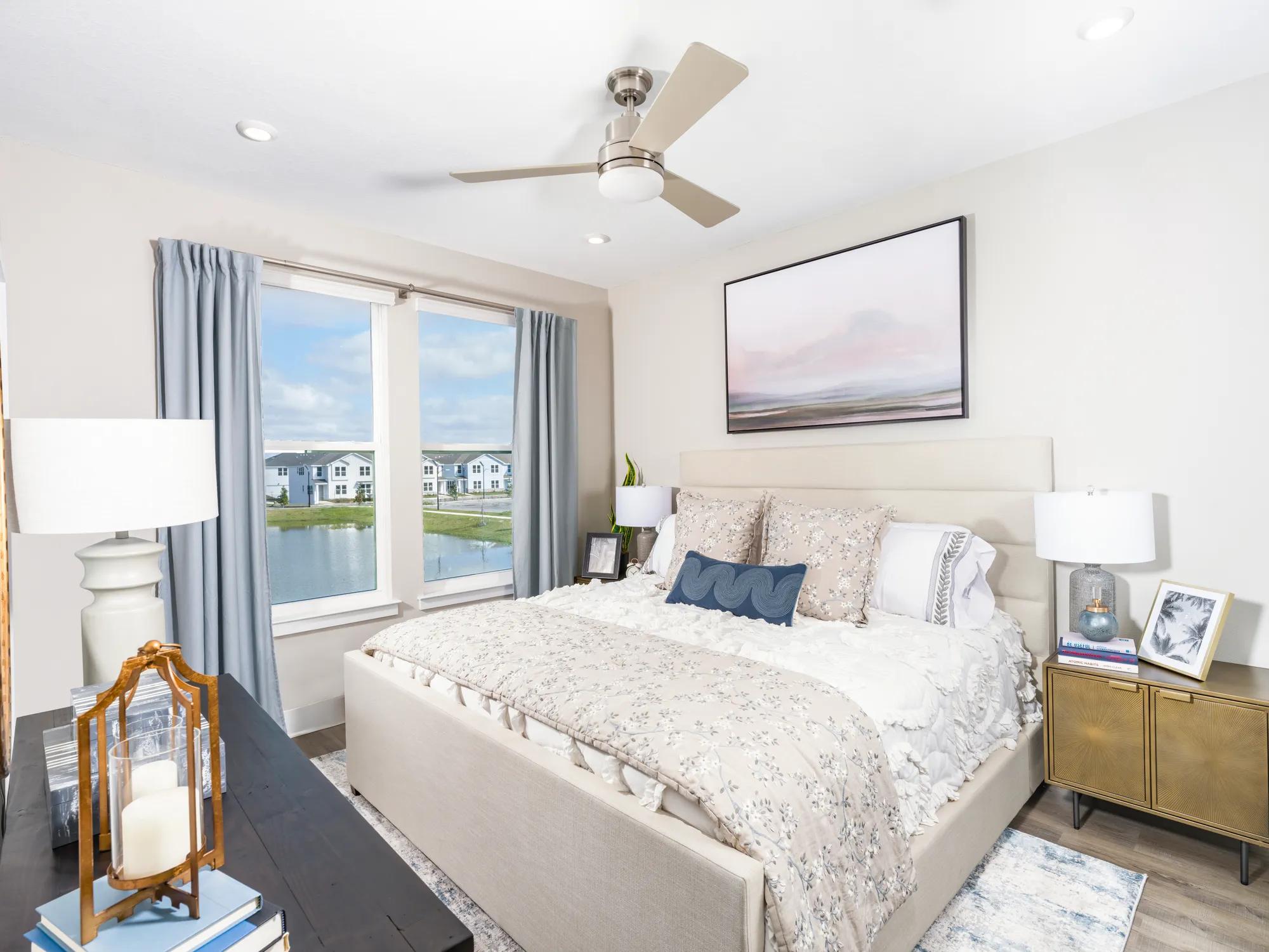 spacious bedroom with large windows  amavi kissimmee homes for rent in kissimmee fl