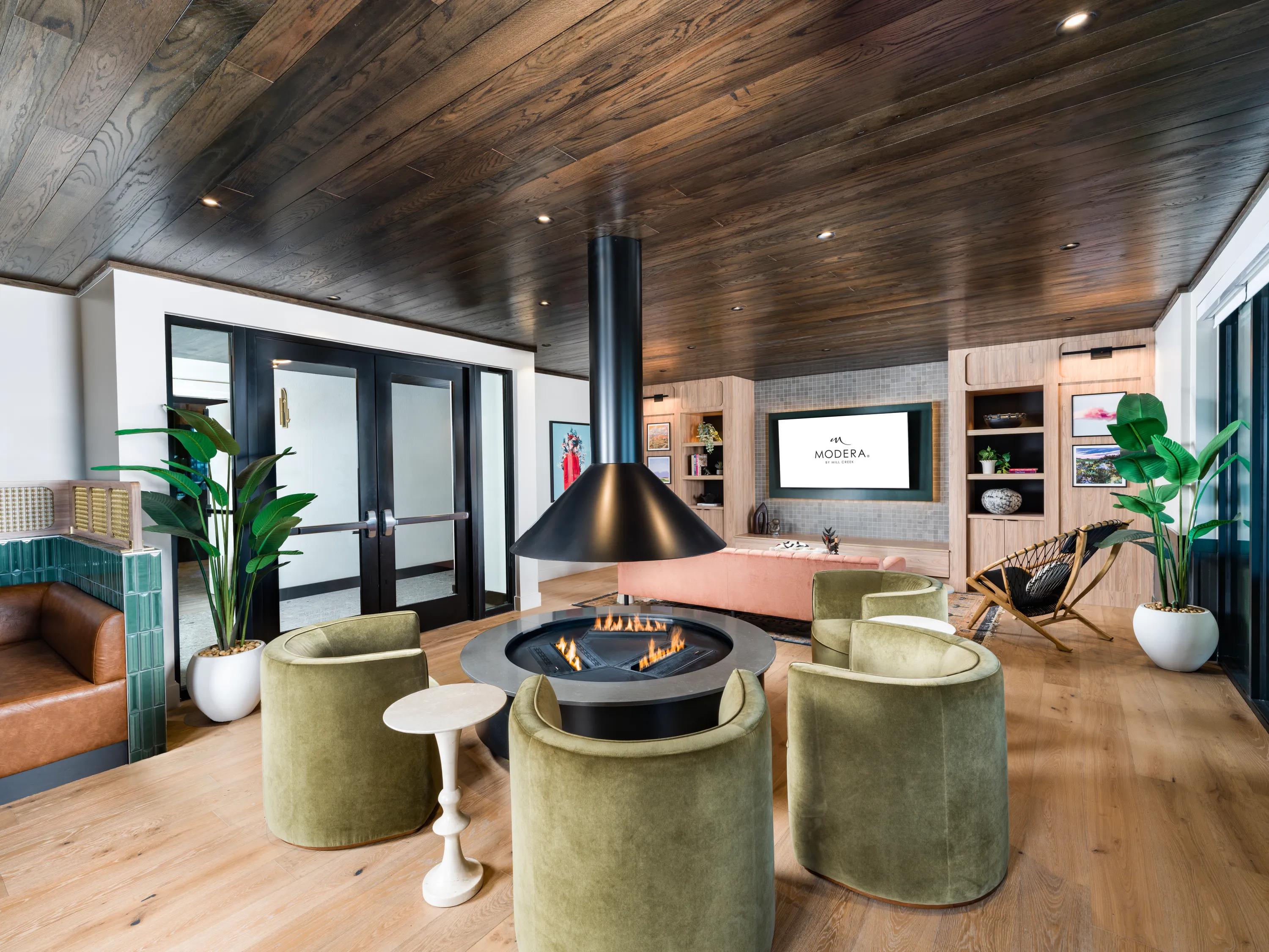 indoor fire table with surround seating modera st paul apartment homes for rent