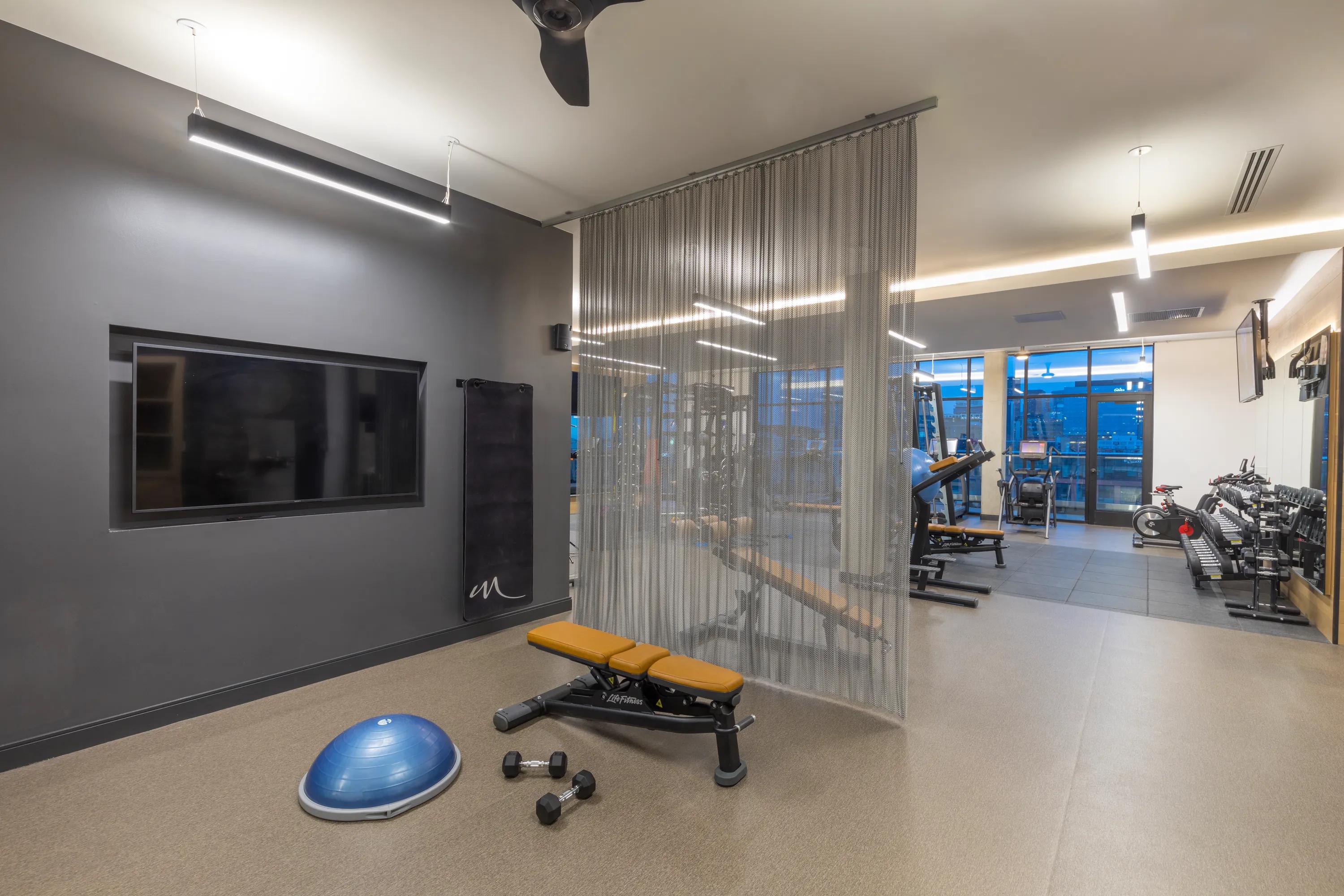 Club quality fitness center with virtual fitness area and a variety of equipmentmodera lohi apartments in denver co