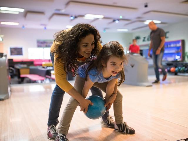 mother and daughter bowling together modera higley commons apartment homes for rent in gilbert az