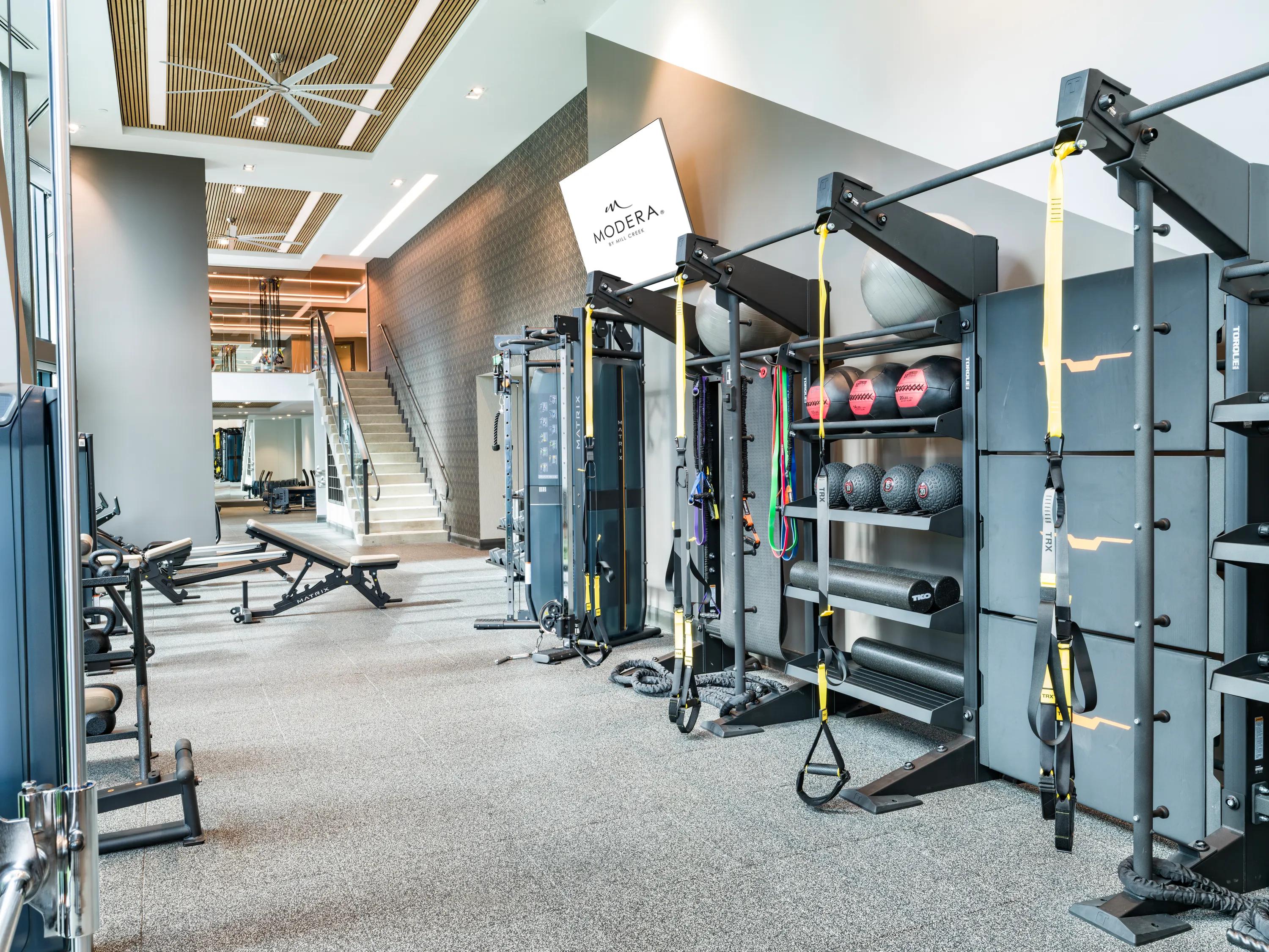 fitness center with weight and cardio equipment modera mcgavock apartment homes for rent in nashville tn