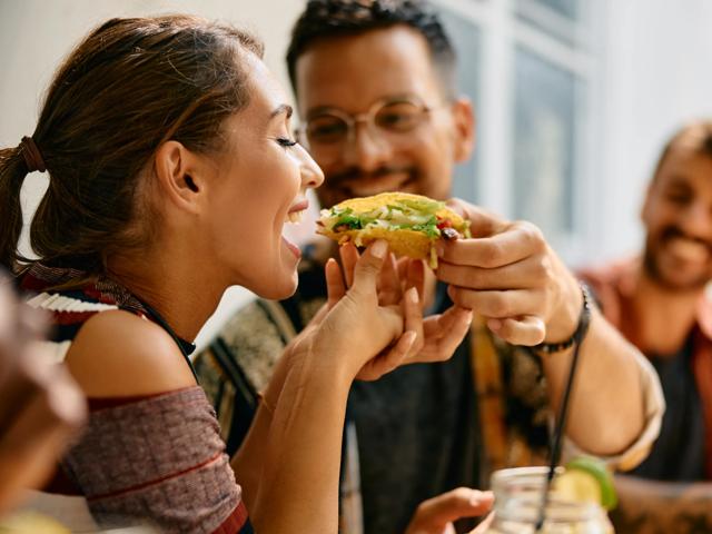people eating tacos and smiling modera sobro apartment homes for rent in nashville tn