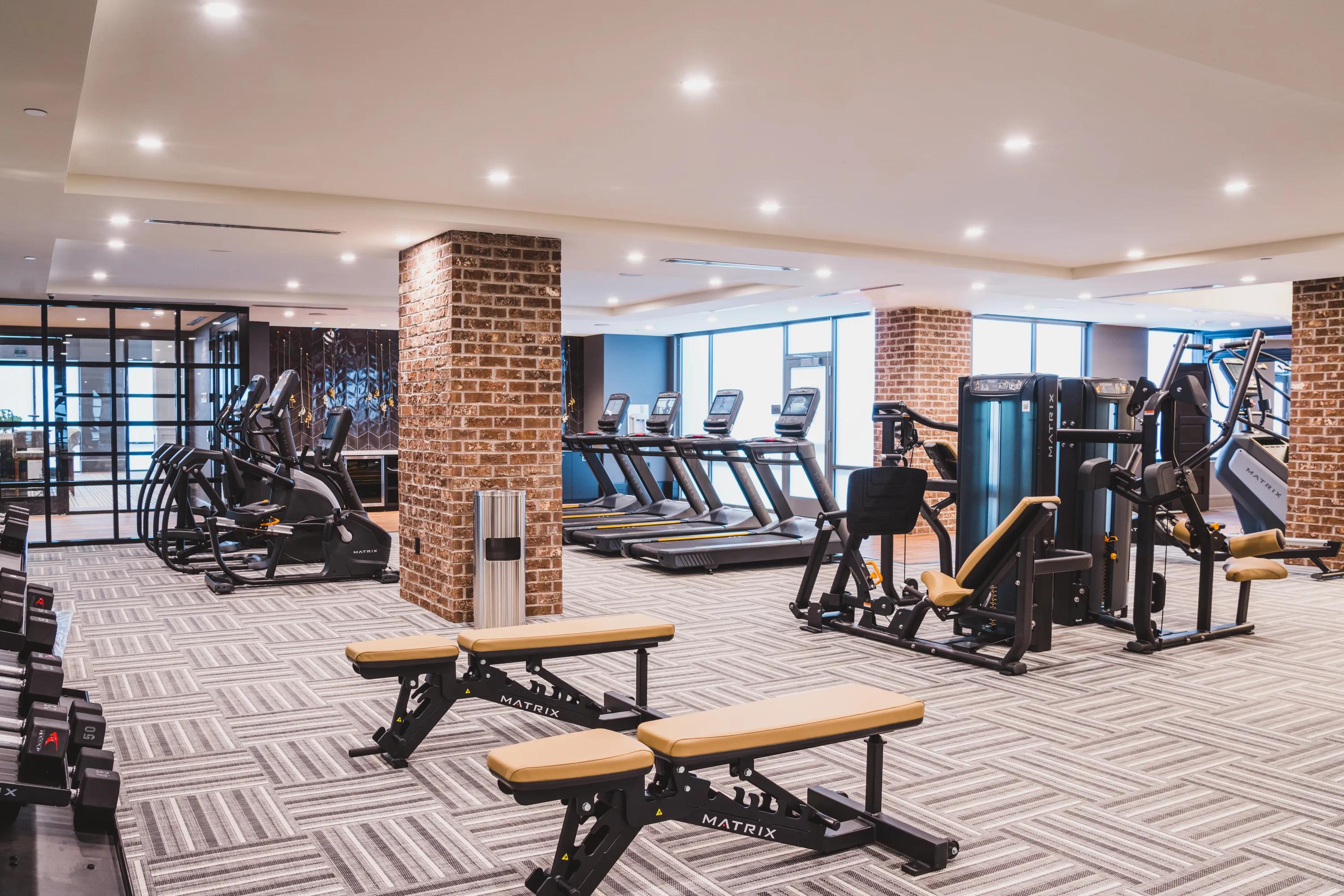 club quality fitness center with weight equipment at modera old ivy apartment homes for rent in atlanta ga
