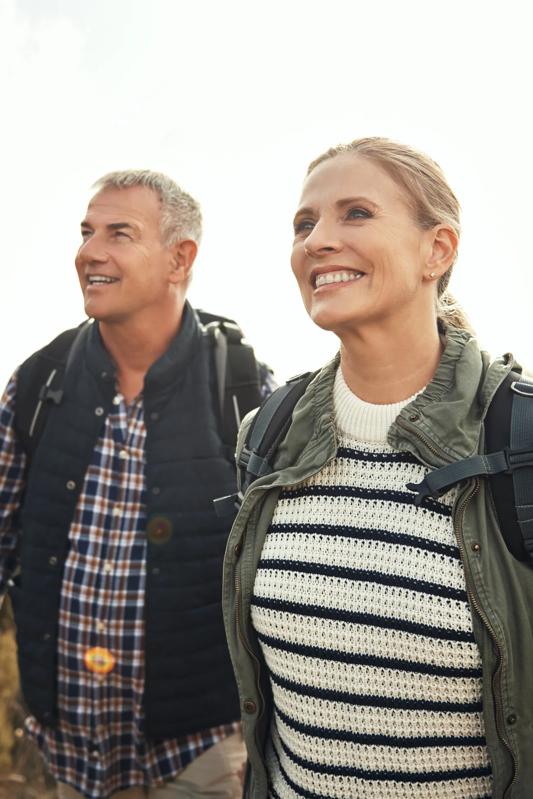 mature couple hiking modera river north apartments in denver co