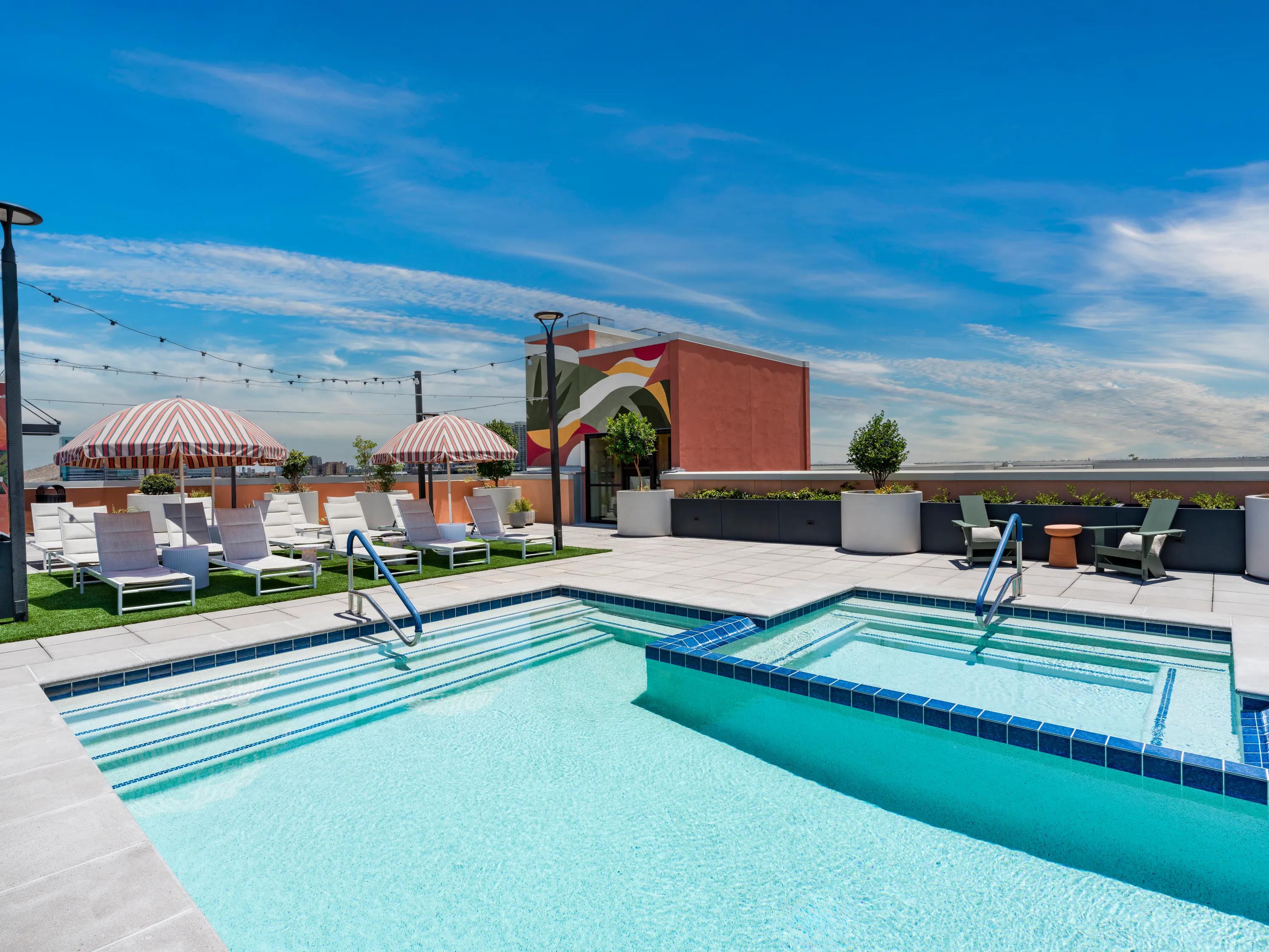 Rooftop pool and spa with sundeck, grilling area, and sweeping views modera rio salado